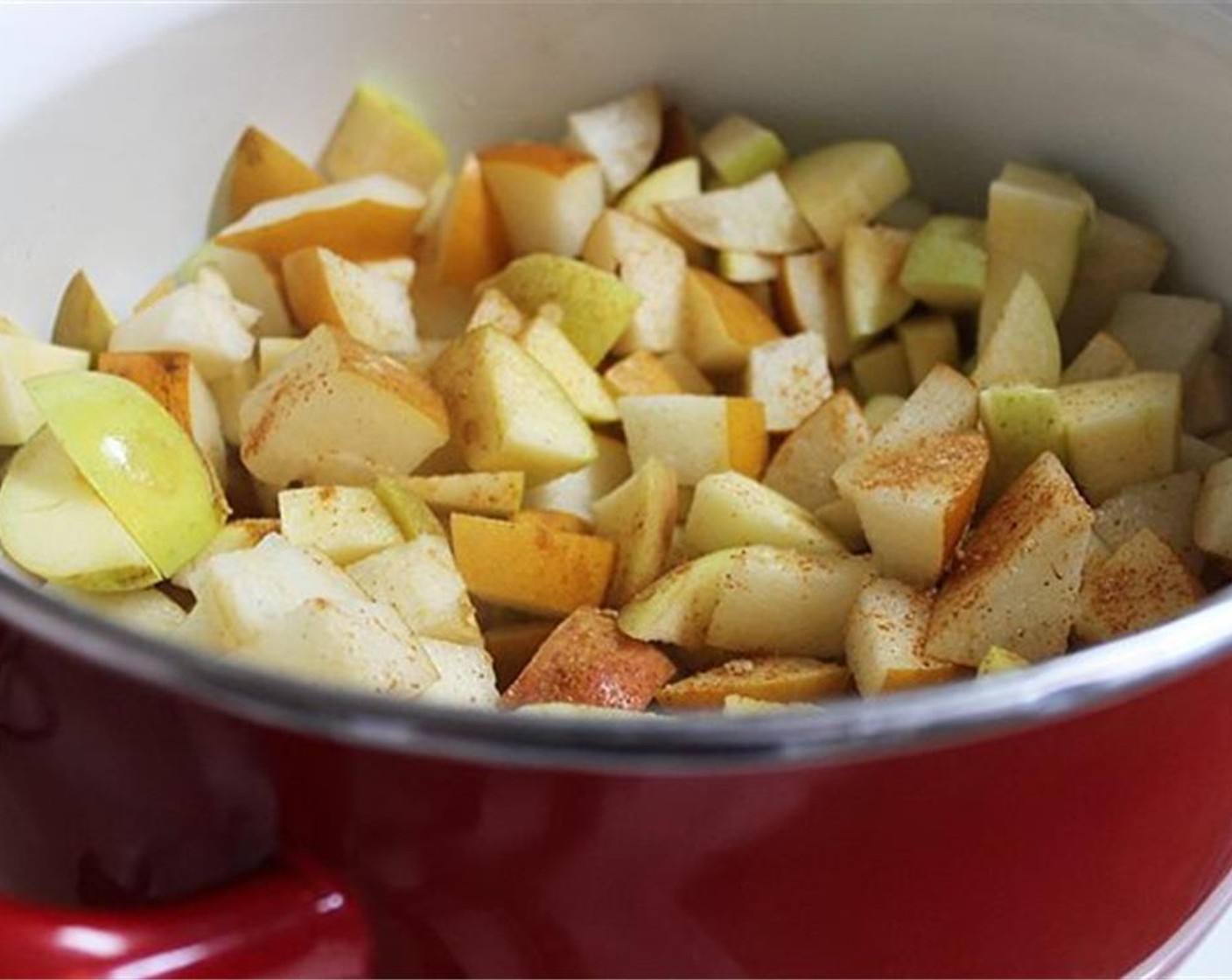 step 1 Core the Asian Pears (4) and Apples (4), and chop into quarter inch pieces. Place fruit in a heavy bottom pot, and turn the stove burner to low.