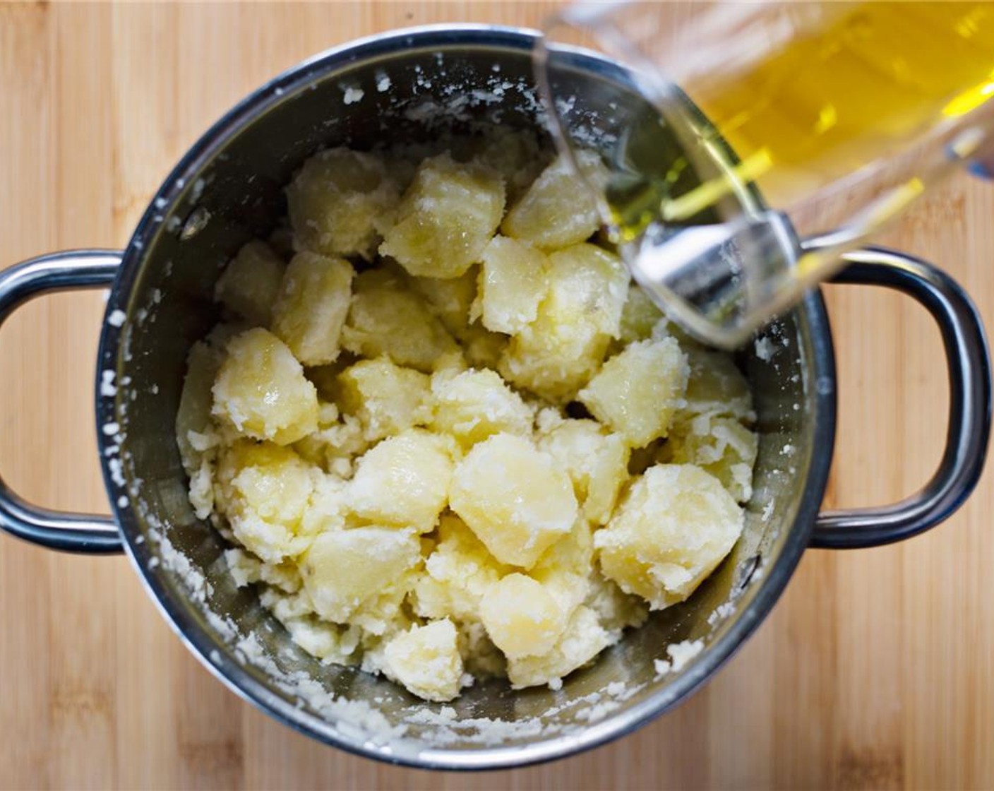 step 9 Drizzle potatoes with Extra-Virgin Olive Oil (2 Tbsp).