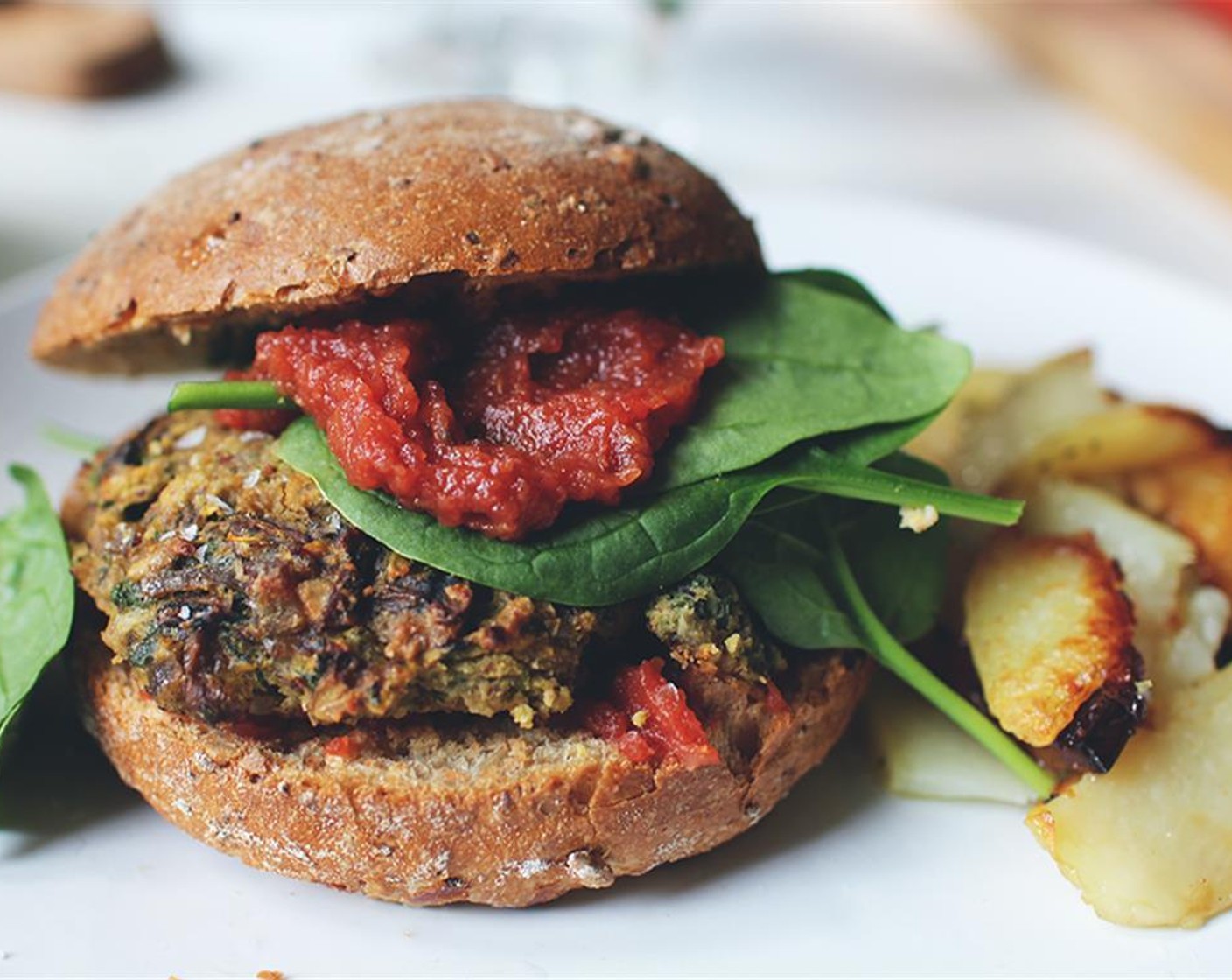 step 6 Serve on Hamburger Buns (4) with Tomato Sauce (to taste) and Fresh Baby Spinach (to taste). Enjoy!