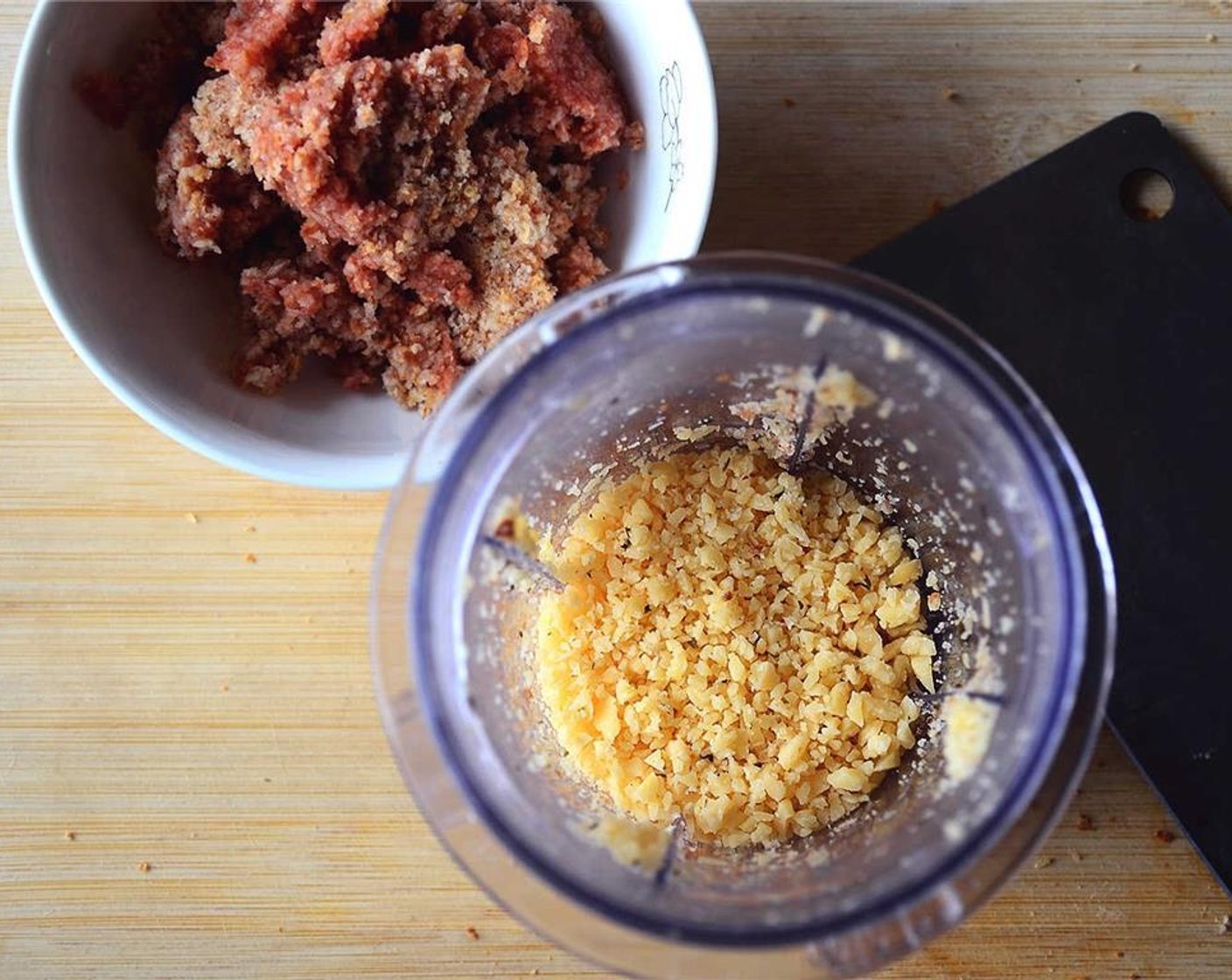 step 7 Add the Aged Goat Cheese (1/3 cup) to the food processor (no need to clean it beforehand) and pulse to form a coarse crumb.