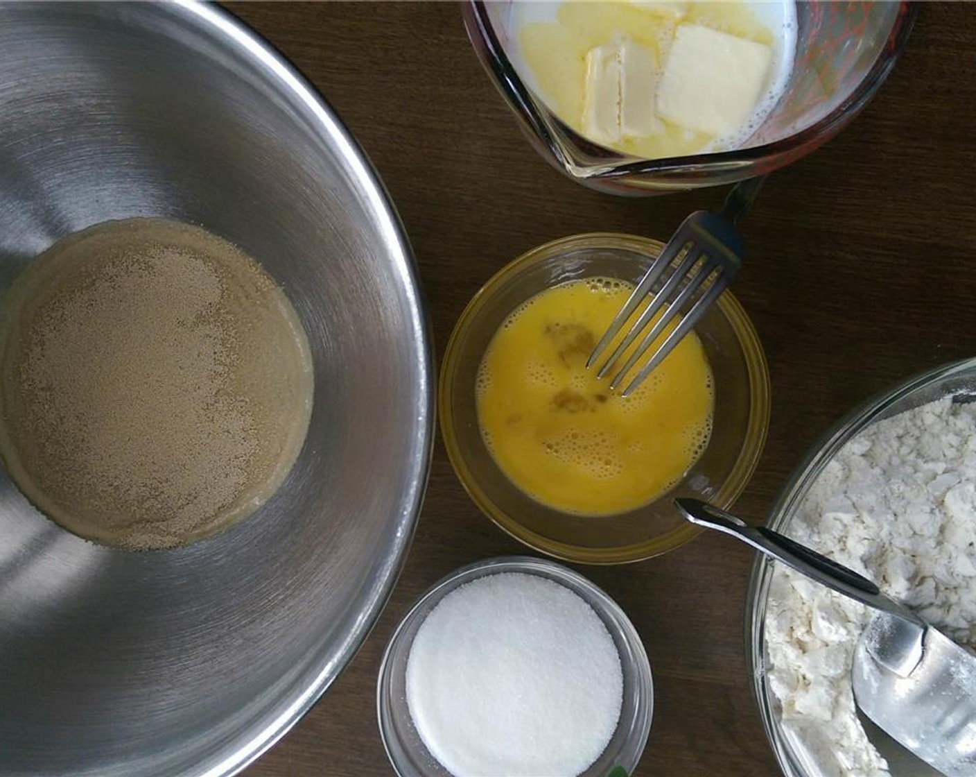 step 1 Dissolve Active Dry Yeast (1/2 Tbsp). Add Water (2 Tbsp), Milk (1/2 cup), Egg (1), 1/4 cup of the Granulated Sugar (1/2 cup), Unsalted Butter (3 Tbsp), Salt (3/4 tsp) and 1 1/4 cups of All-Purpose Flour (2 1/4 cups).