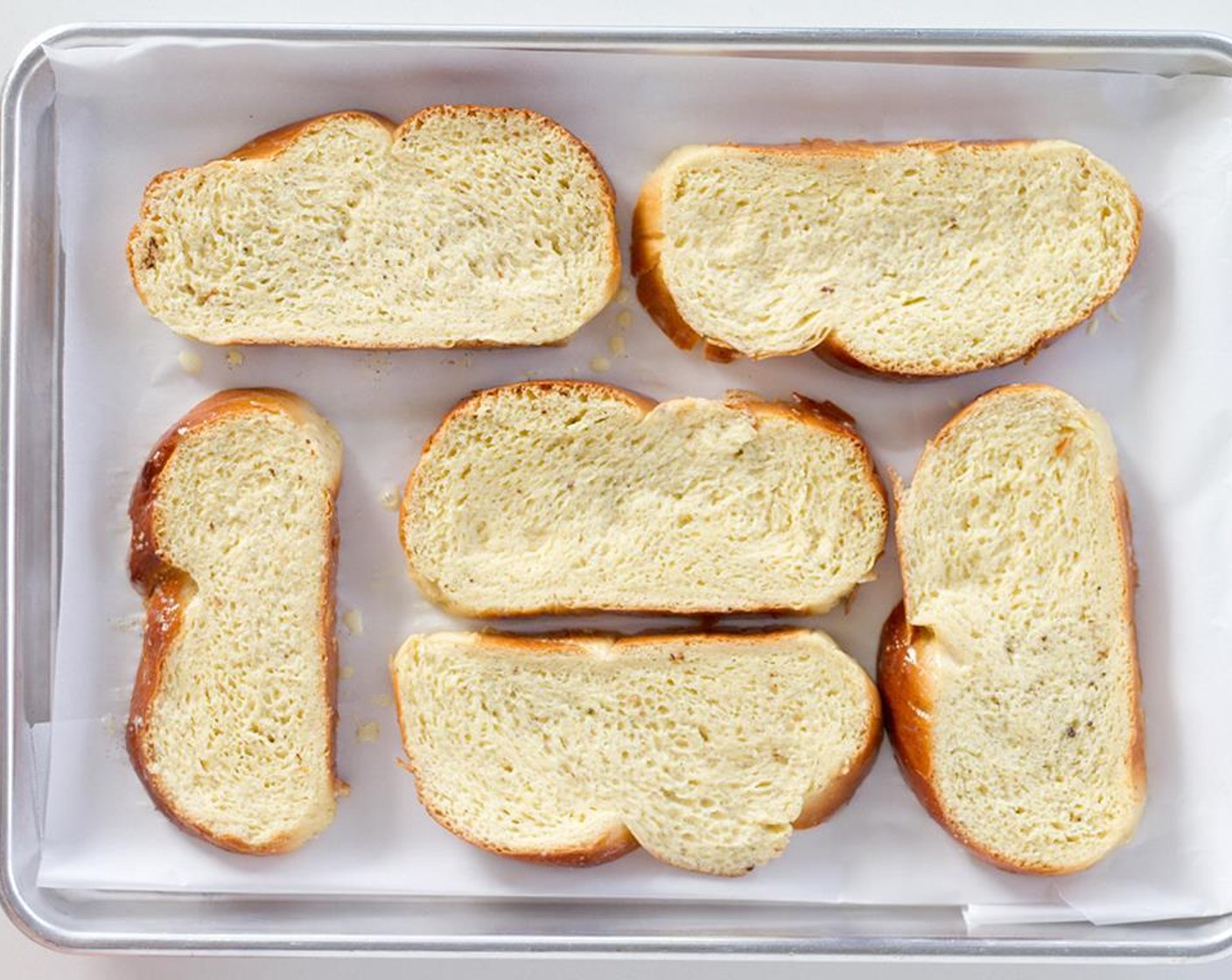 step 6 Place soaked bread on a parchment paper lined baking sheet (optional: dust with Ground Cinnamon (to taste) and bake for 15-20 minutes.