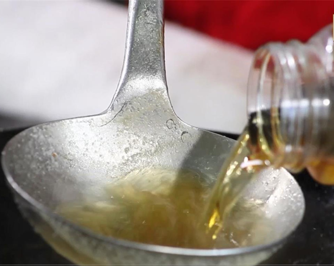 step 4 Add the Canola Oil (1 Tbsp) into the pot.