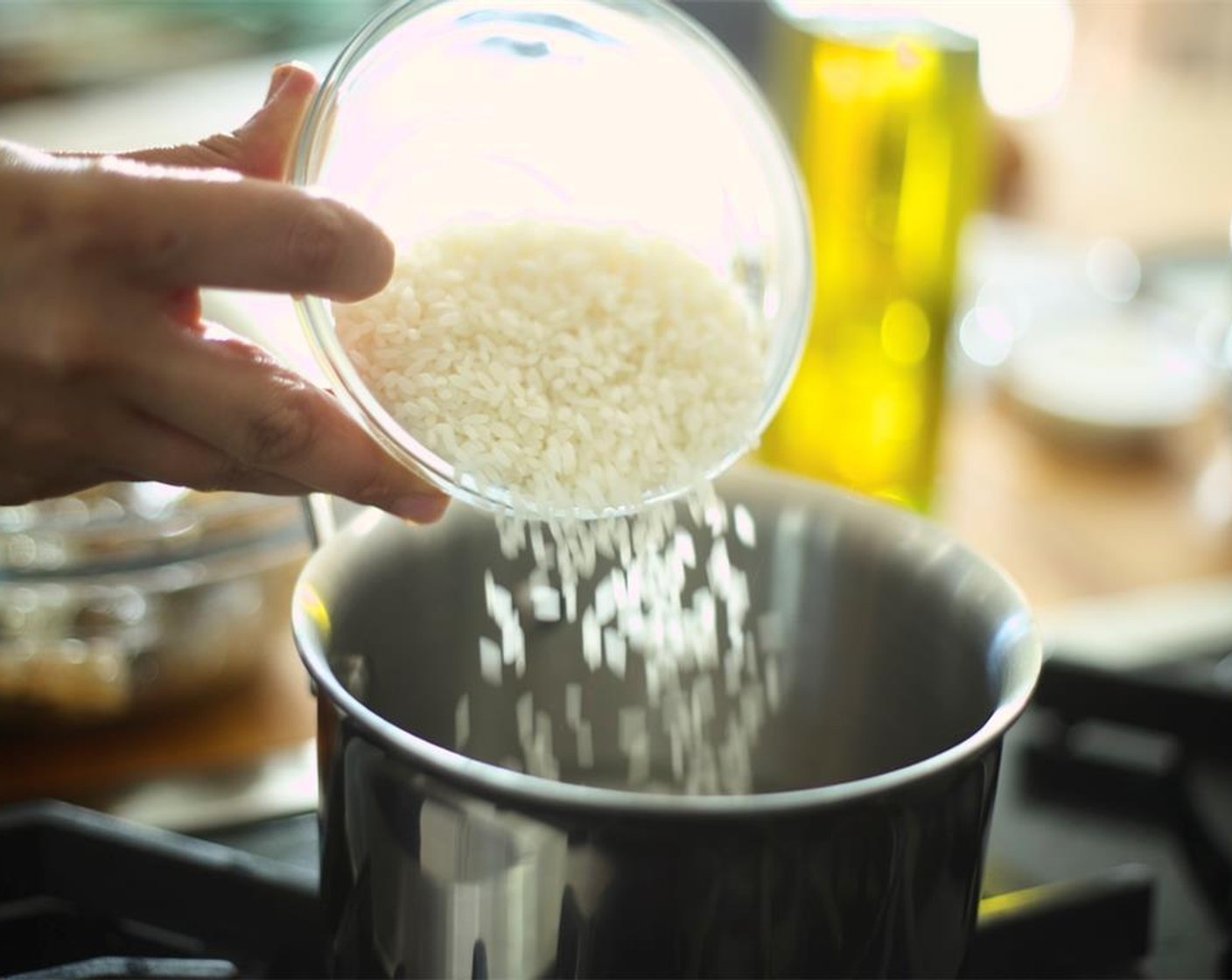 step 2 In a small saucepan, add one cup of cold water with Glutinous Rice (1/2 cup) and stir.