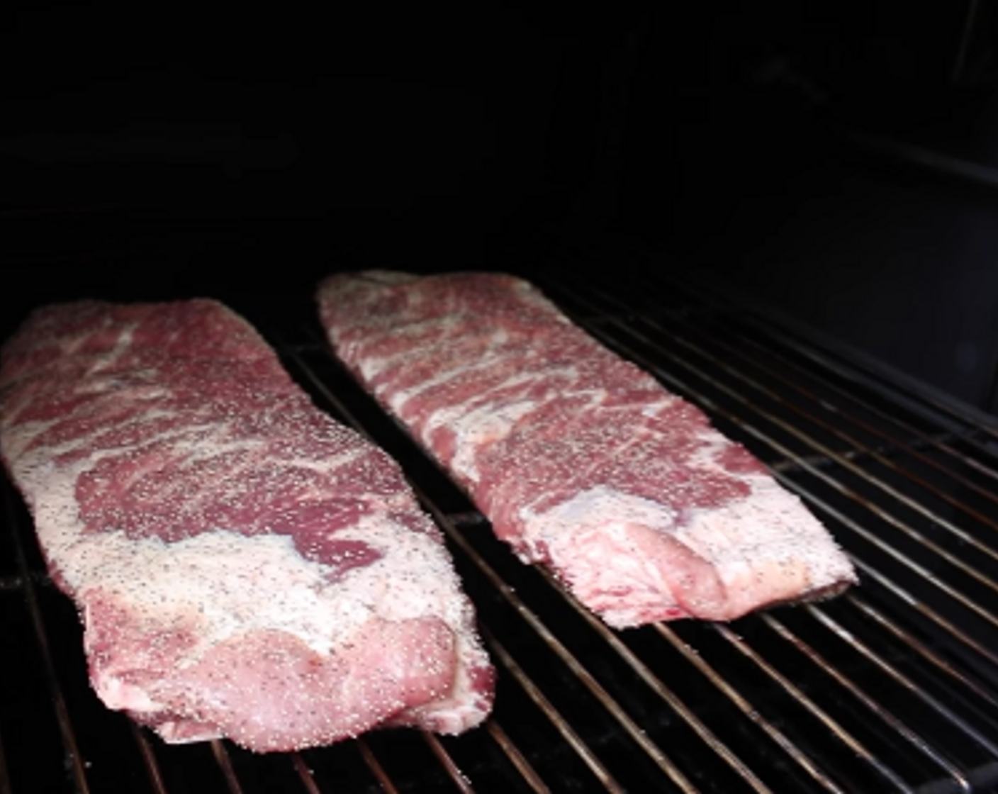 step 4 Place ribs on smoker and add pecan wood chunks to the fire for smoke. Cook for 2 1/2 hours.