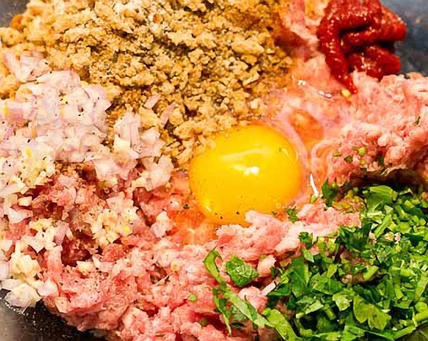 step 2 In a bowl, mix Ground Turkey (1 lb), Egg (1), Breadcrumbs (1/2 cup), Fresh Parsley (1/4 cup), Garlic (1 clove), Shallot (1/4 cup), Tomato Paste (1 Tbsp), Salt (1 tsp) and Ground Black Pepper (1 tsp) together thoroughly with your hands.