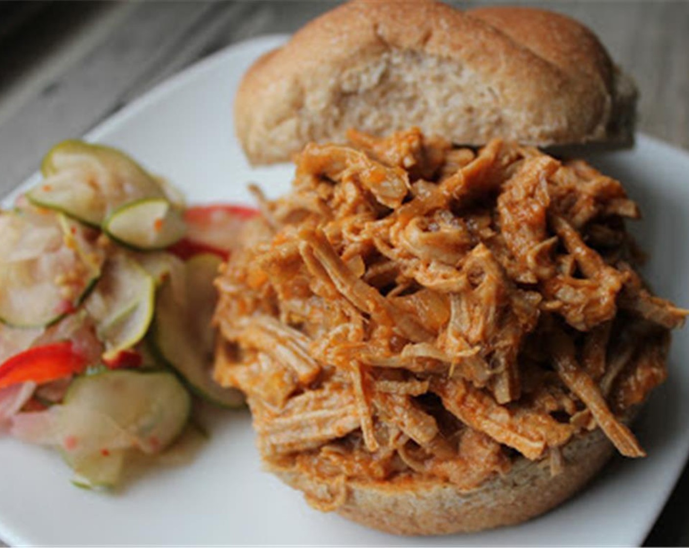 step 9 Pile the pork onto Whole Wheat Hamburger Buns (4), top with the sweet and spicy pickles, and go hog wild!