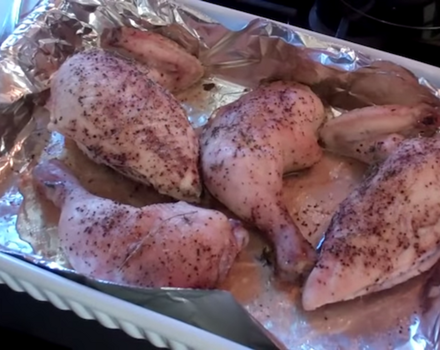 step 4 Line the baking dish with aluminum foil. With your oven set at 375 degrees F (190 degrees C), place the baking dish with the seasoned chicken on the middle rack and let cook for 45 minutes.