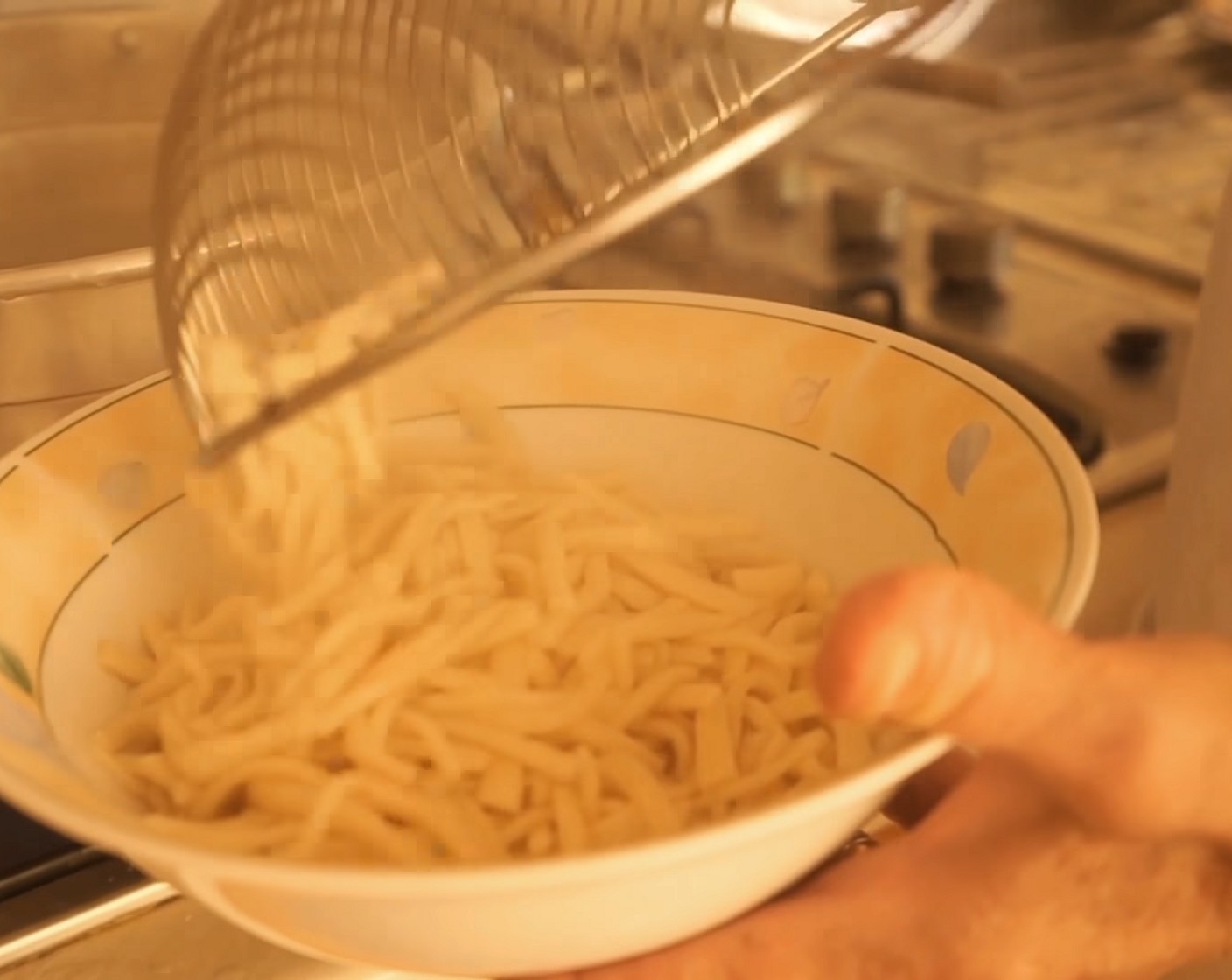 step 10 Once the water boils, cook the sagne for 5-6 minutes then drain and transfer them to a large bowl.