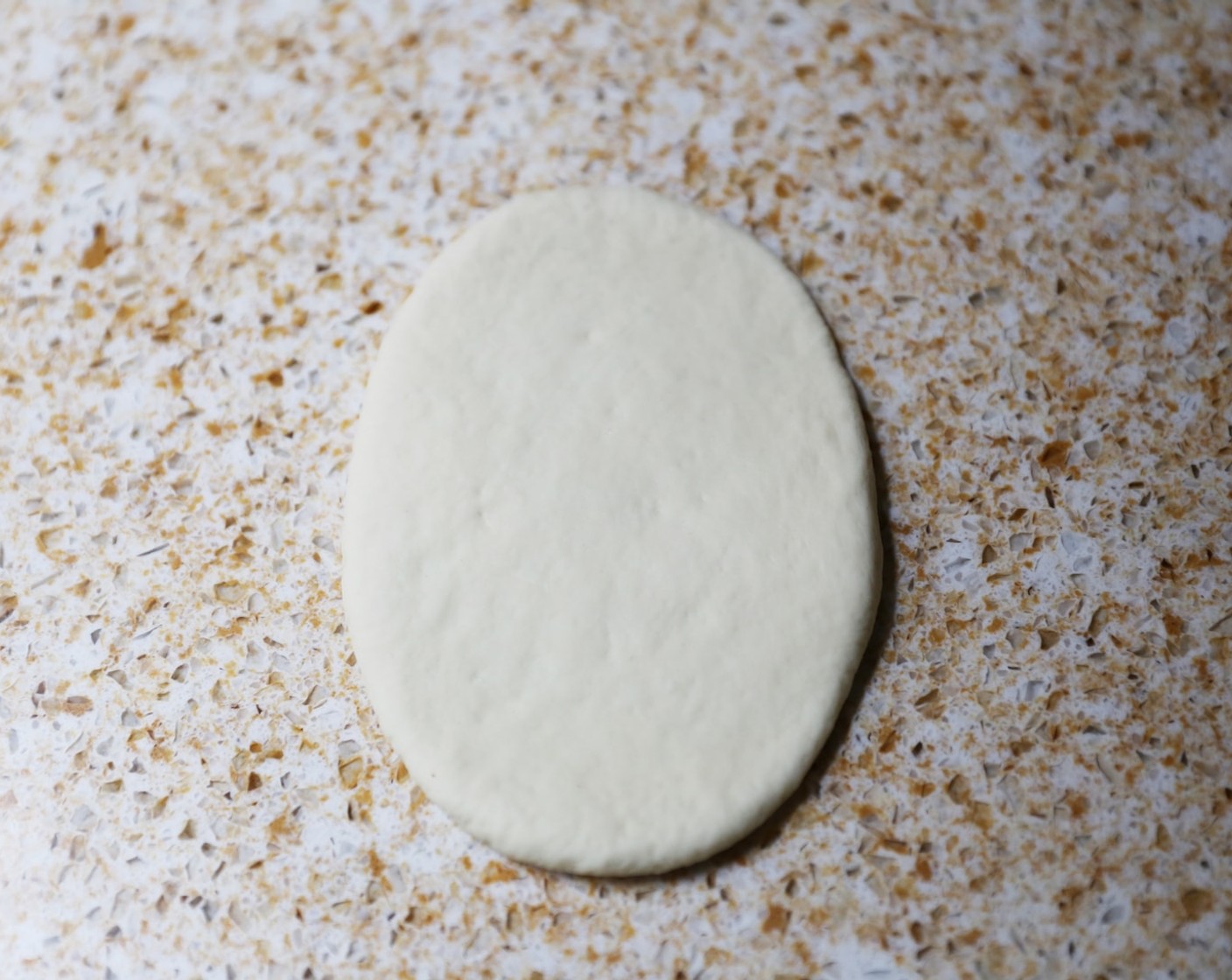 step 11 Use a rolling pin to roll out each ball, into an oval shape about 3-4mm thick.
