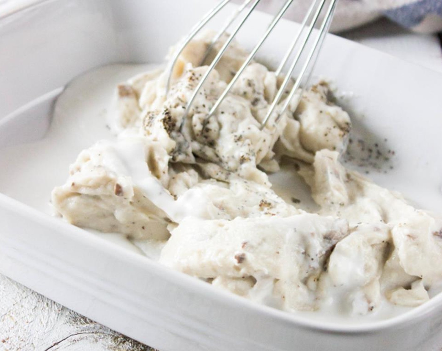 step 7 In a casserole dish add Condensed Cream of Mushroom Soup (1 cup), Coconut Milk (1/3 cup), Salt (1/2 tsp), Ground Black Pepper (1/2 tsp) 1/2 cup french fried onions and mix well.