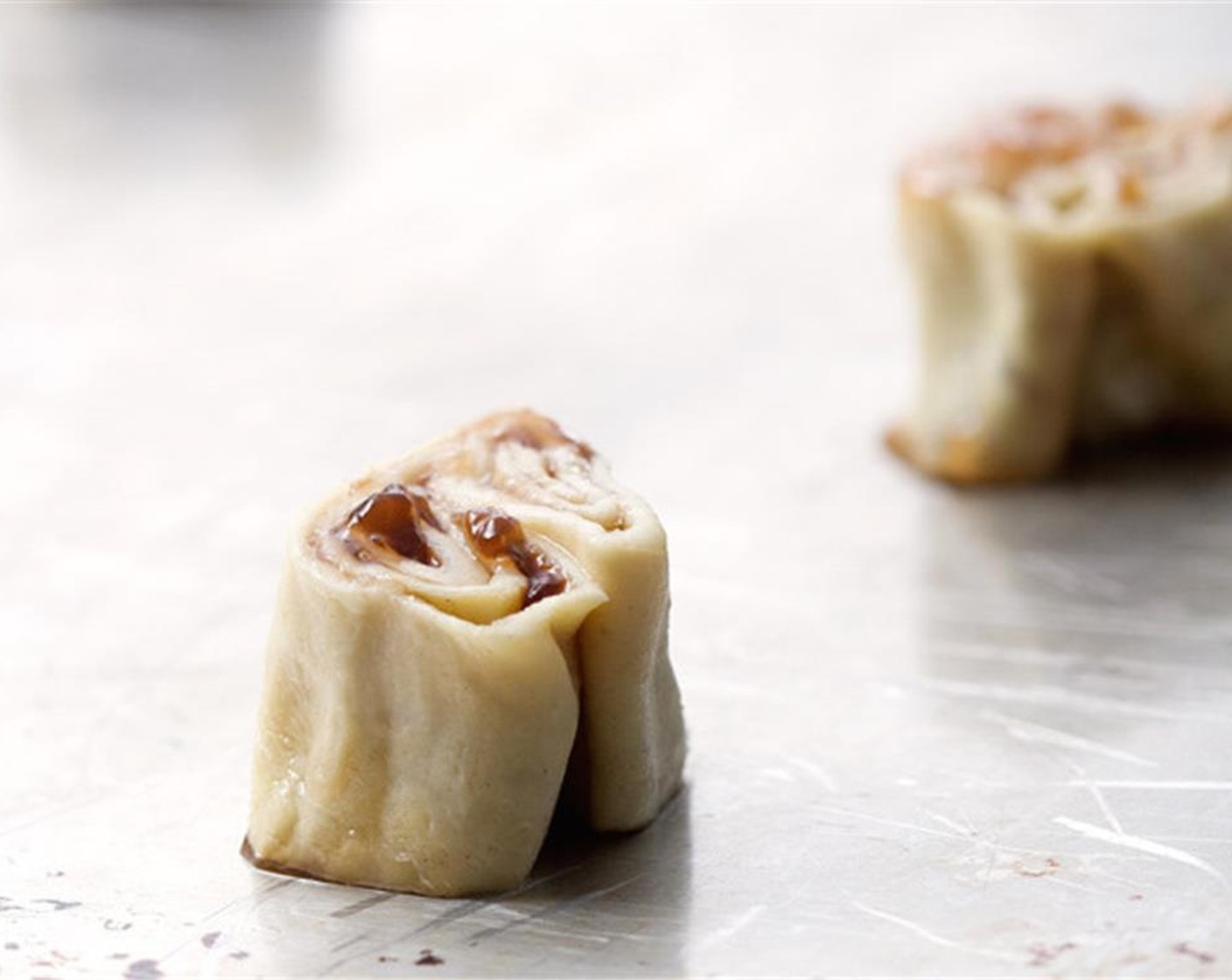 step 8 Bake in batches for 3-4 minutes, or until the tops are golden brown. Using a spatula, turn, and continue baking for another 3-4 minutes.