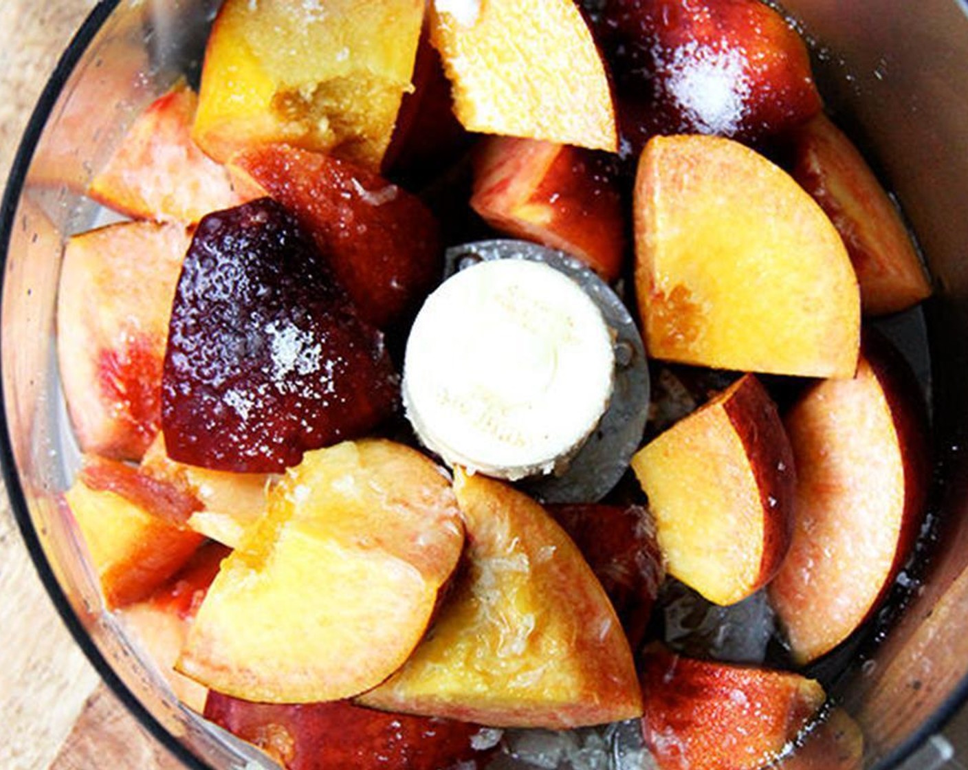 step 1 Place the Peaches (2), Granulated Sugar (to taste), and Lime (1/2) in the bowl of a food processor fitted with a steel blade and process until smooth. Press the mixture through a sieve.