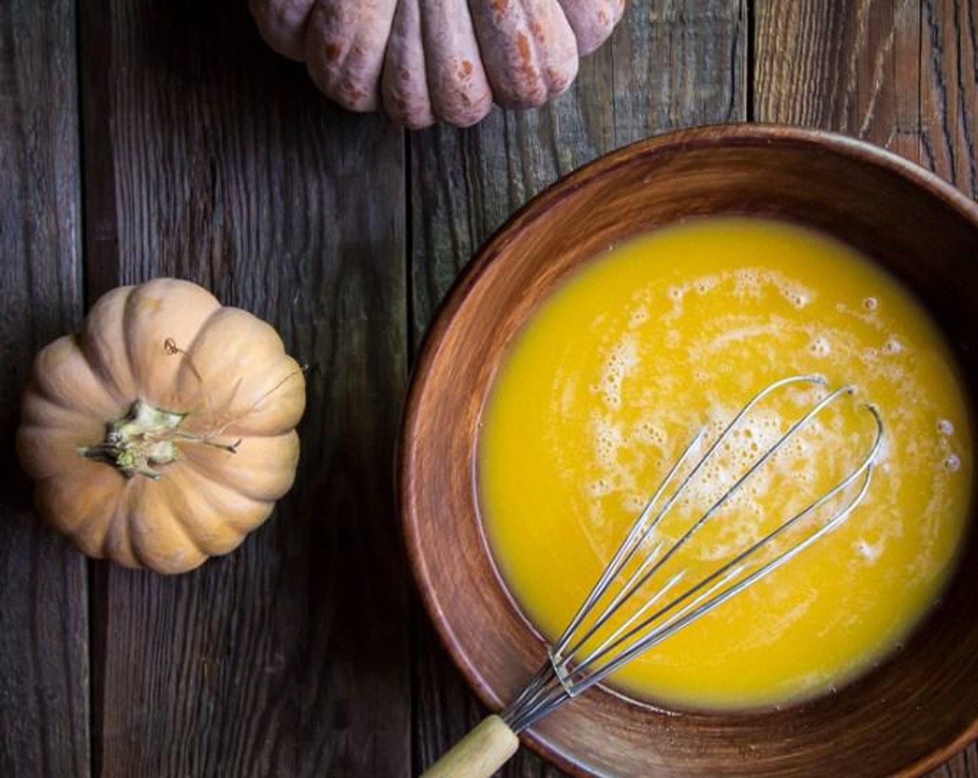 step 2 Once yeast has foamed, add Canned Pumpkin Purée (1/2 cup) to bowl and whisk until combined. Add in All-Purpose Flour (2 cups) and Fine Salt (1/2 tsp) and stir until mixture is well comined.