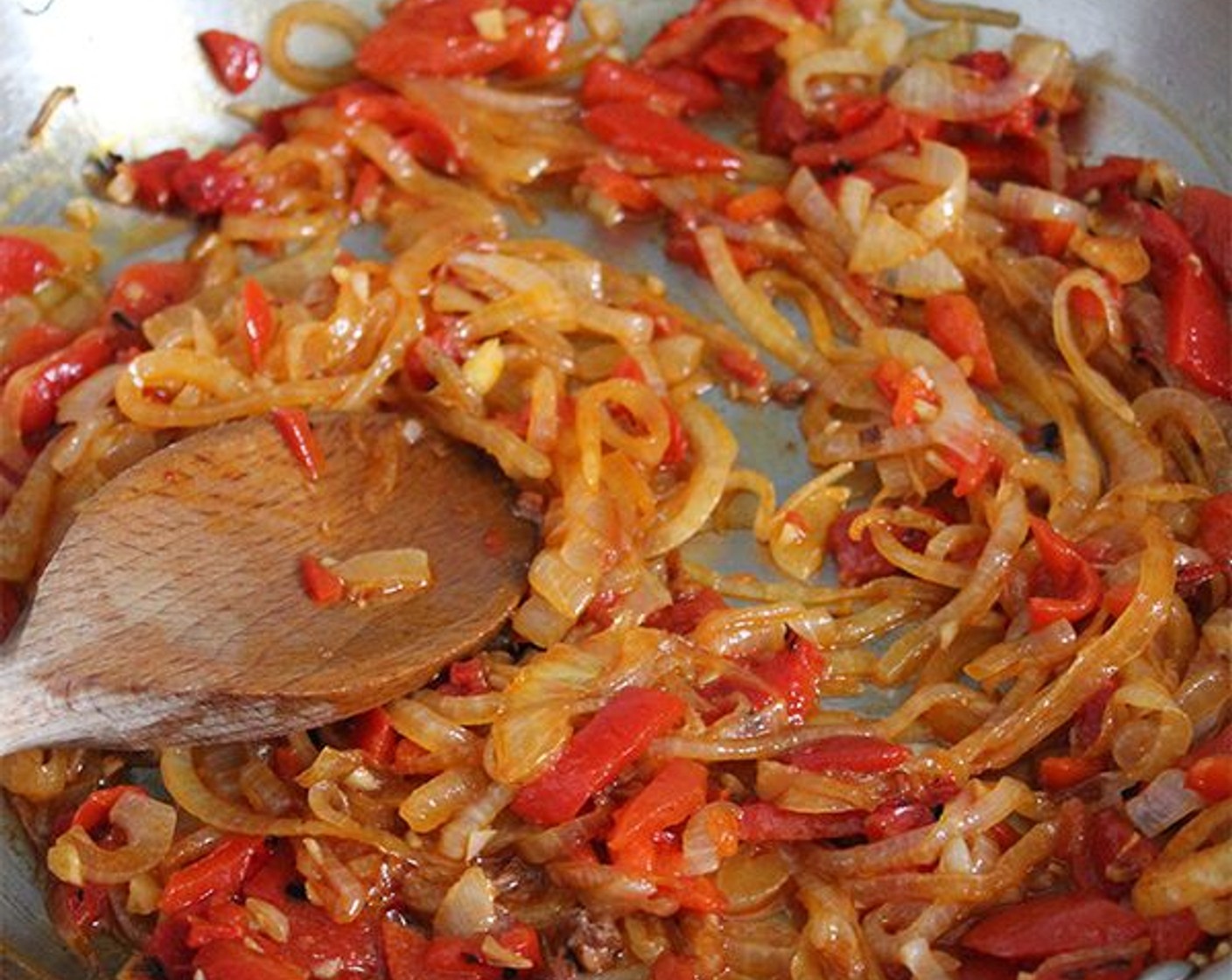 step 2 Add the Jarred Roasted Red Peppers (3/4 cup), Anchovy Fillets (2), if using, Garlic (1 1/2 Tbsp), Spanish Smoked Sweet Paprika (1 tsp), and Cayenne Pepper (1 pinch), and cook for 1 more minute, until the garlic is fragrant. Careful not to let the garlic burn!