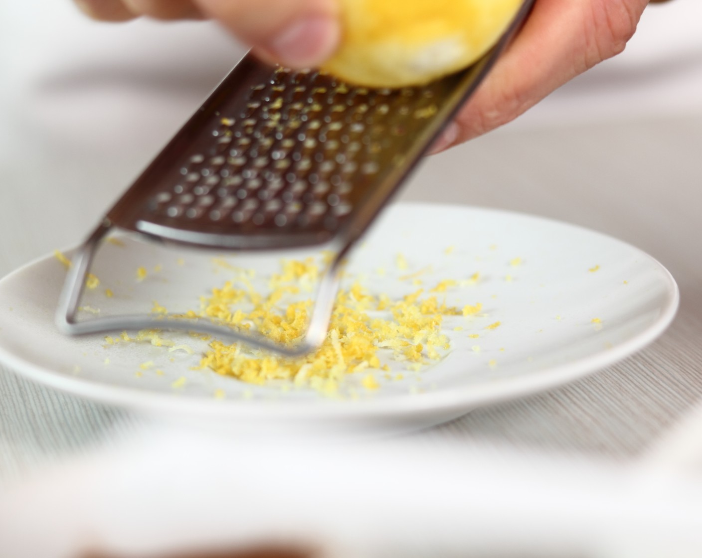 step 3 Into a large bowl, zest remaining Navel Oranges (2), and using a citrus juicer, squeeze the juice into a bowl. Add Almond Extract (2 tsp), Kemps Half & Half (2 1/2 cups), Eggland's Best Classic Eggs (3), and Maple Syrup (1 cup) and whisk. Toss Croissants (7 cups) pieces with mixture and let soak for 10 minutes.