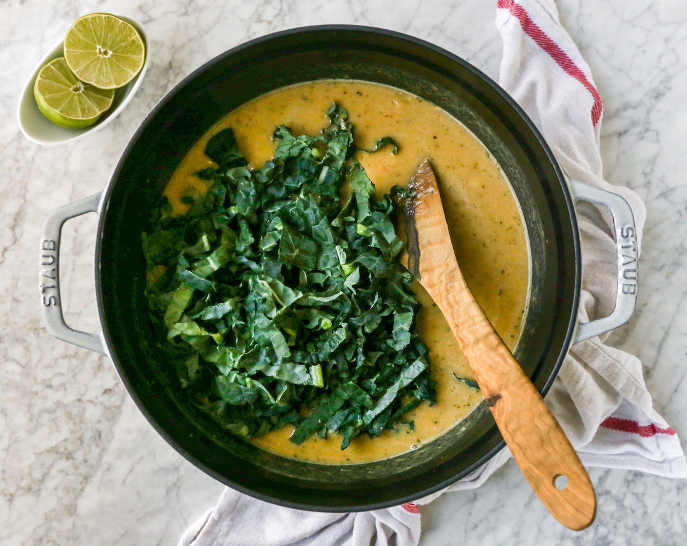 step 8 Stir in the Kale (1 cup) and Lime (1). The residual heat will help to add heat to all of these.