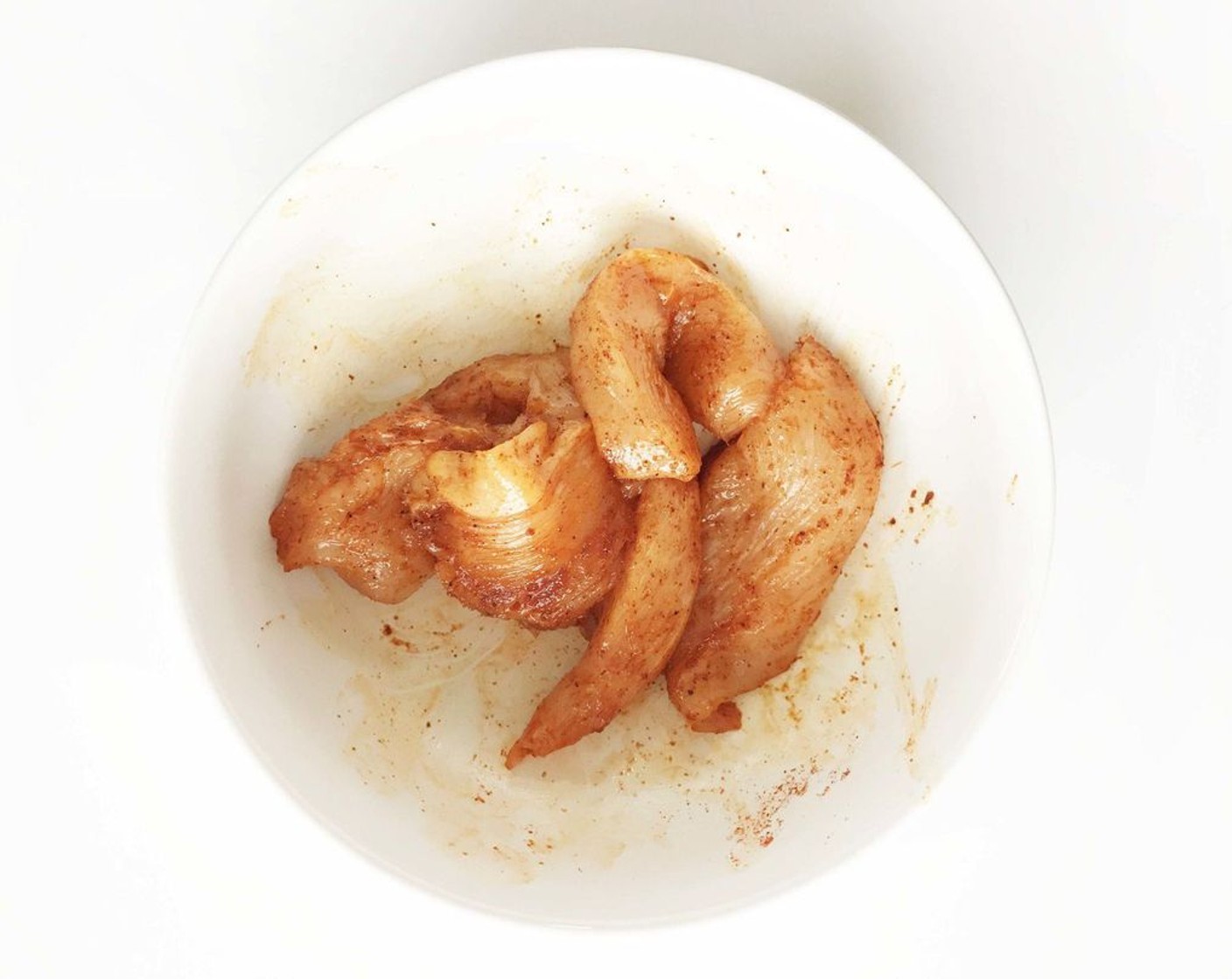 step 3 Place the Chicken Tenders (1 lb) into a medium bowl along with the Extra-Virgin Olive Oil (1 Tbsp) and the seasoning mix. Toss (or use clean/gloved hands) to coat the chicken with the oil and spices evenly.