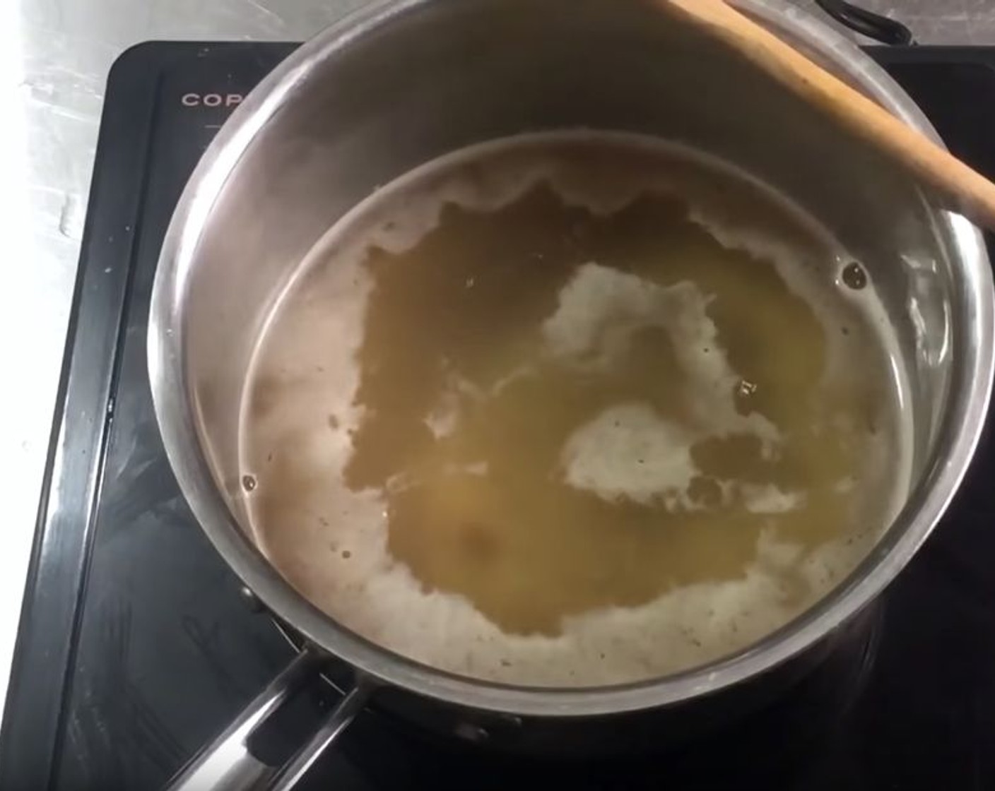 step 1 Into a pot, add Chicken Stock (2 1/2 cups) and bring to a boil.