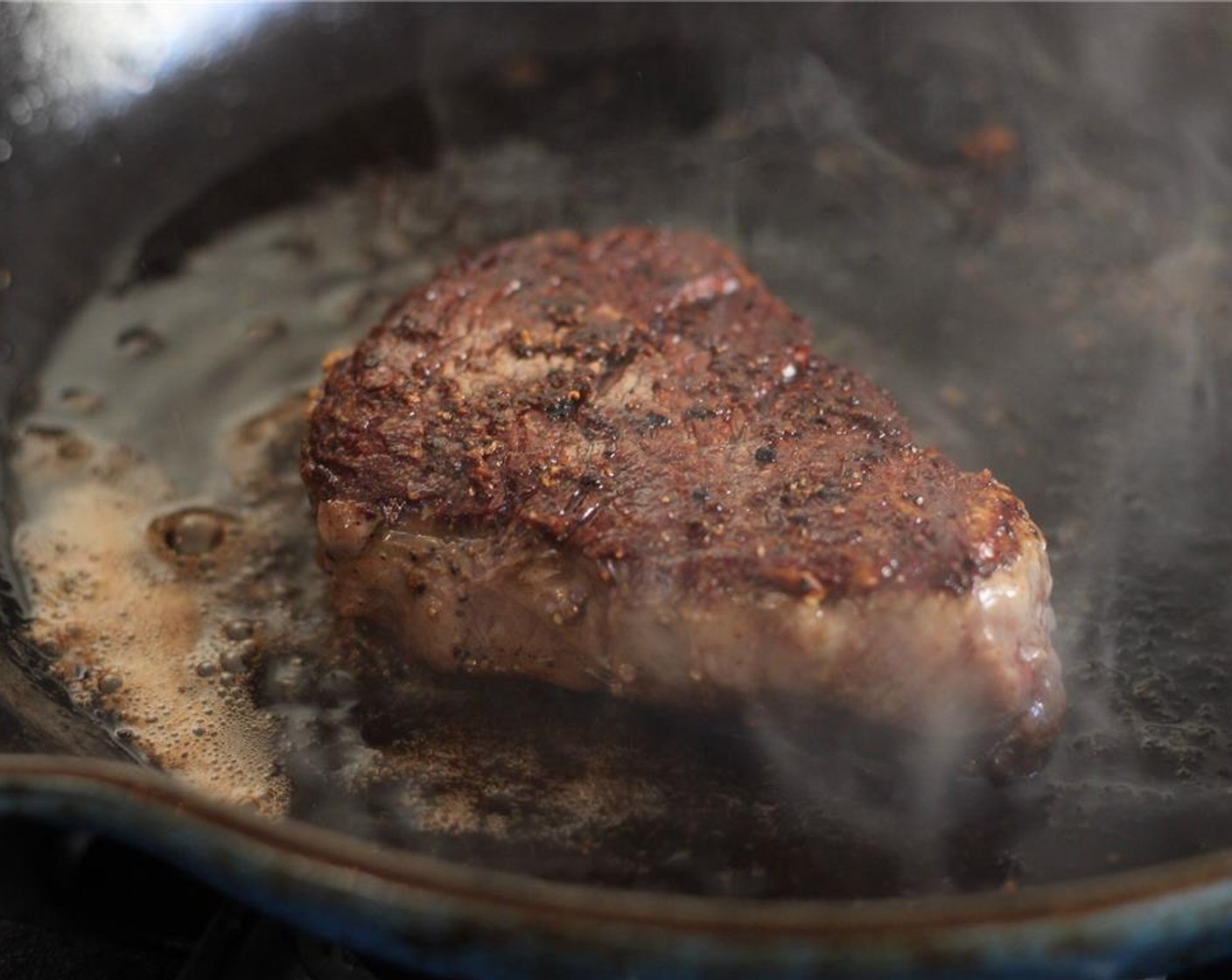 step 3 When the steaks have a brown crust on both sides, remove them from the pan and set aside. Cover to keep warm.