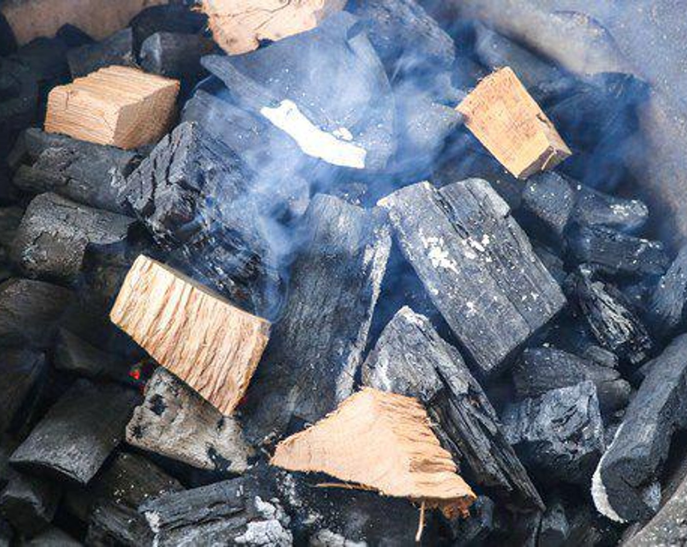 step 1 Prepare Smoker for indirect cooking at 275 degrees F (140 degrees C) using chunks of Post Oak added to the hot coals for smoke flavor.