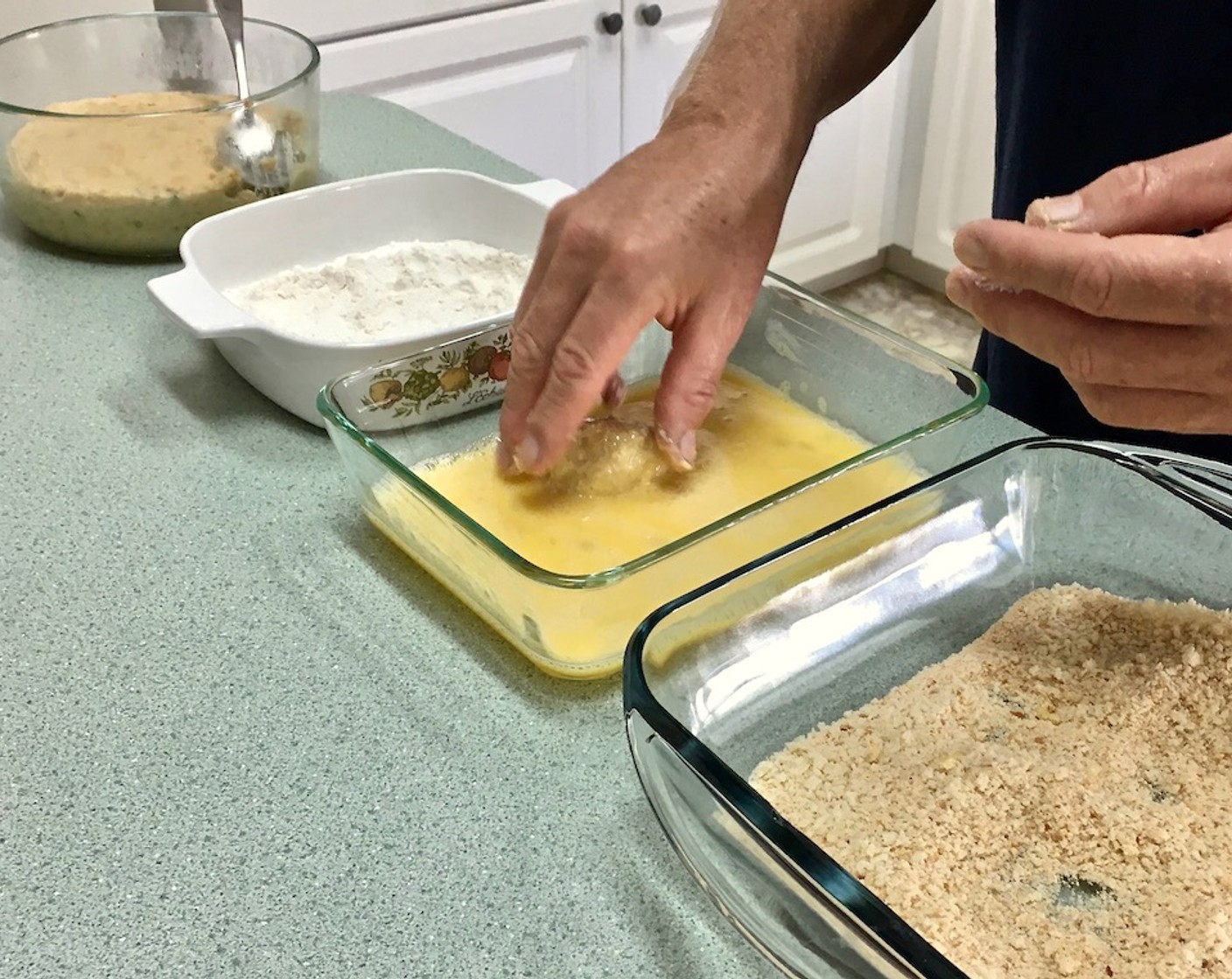 step 17 Roll the croqueta in the flour until covered, dip it into the egg, and then roll it in the bread crumbs.