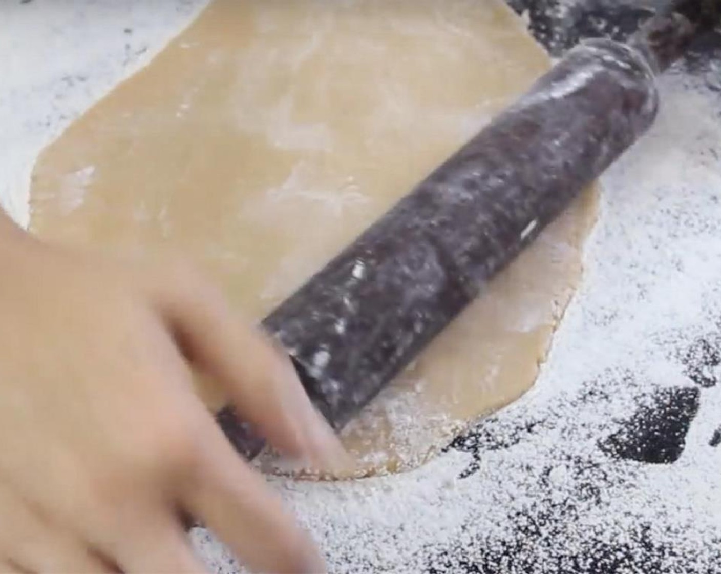 step 6 Dust your countertop with some flour, roll out your dough until half a centimeter thickness.