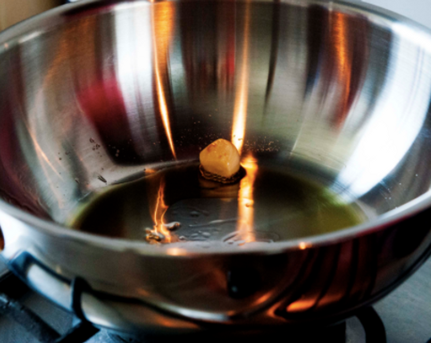 step 1 In a skillet heat up Extra-Virgin Olive Oil (2 Tbsp) and Garlic (1 clove). Saute on low heat until garlic gets a nice golden color.