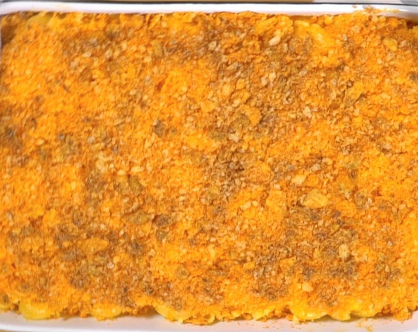 step 7 Bake in the oven until golden brown-keep an eye because the Doritos brown quicker than the Cheetos. Let rest for 5 minutes, then serve.