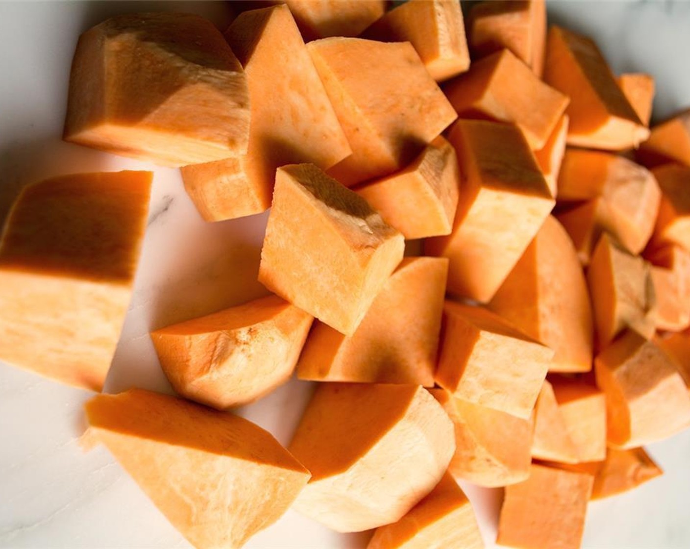 step 2 Peel the Sweet Potatoes (2) and chop into chunks. Boil the chunks until soft, you'll be making puree later.