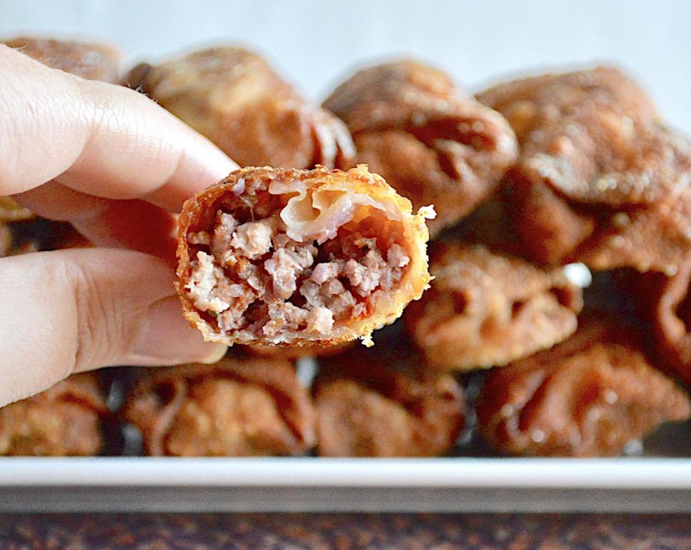 step 7 Let egg rolls drain on a plate lined with paper towels as you cook the rest. Serve immediately with either Duck Sauce (to taste). Enjoy!