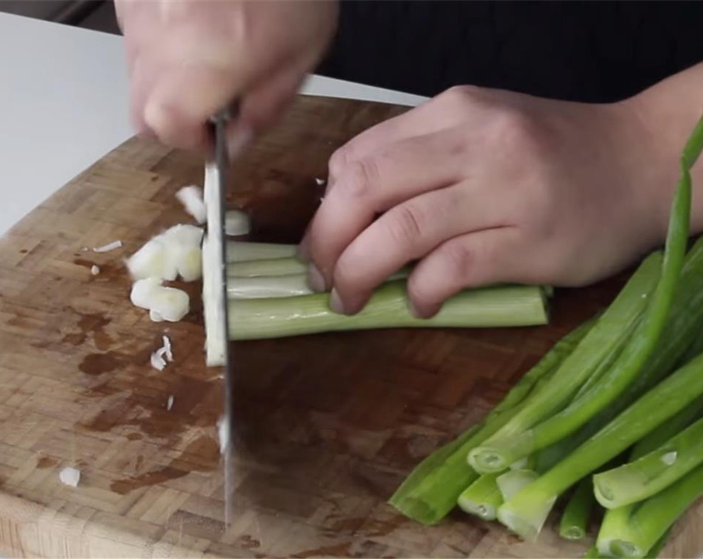 step 4 Slice the white part of the Scallion (1 bunch) thinly. Set aside.