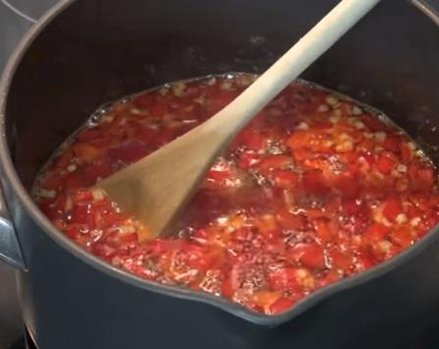 step 2 Add the Garlic (2 cloves) to the pot, and allow the mixture to simmer for another 15 minutes.