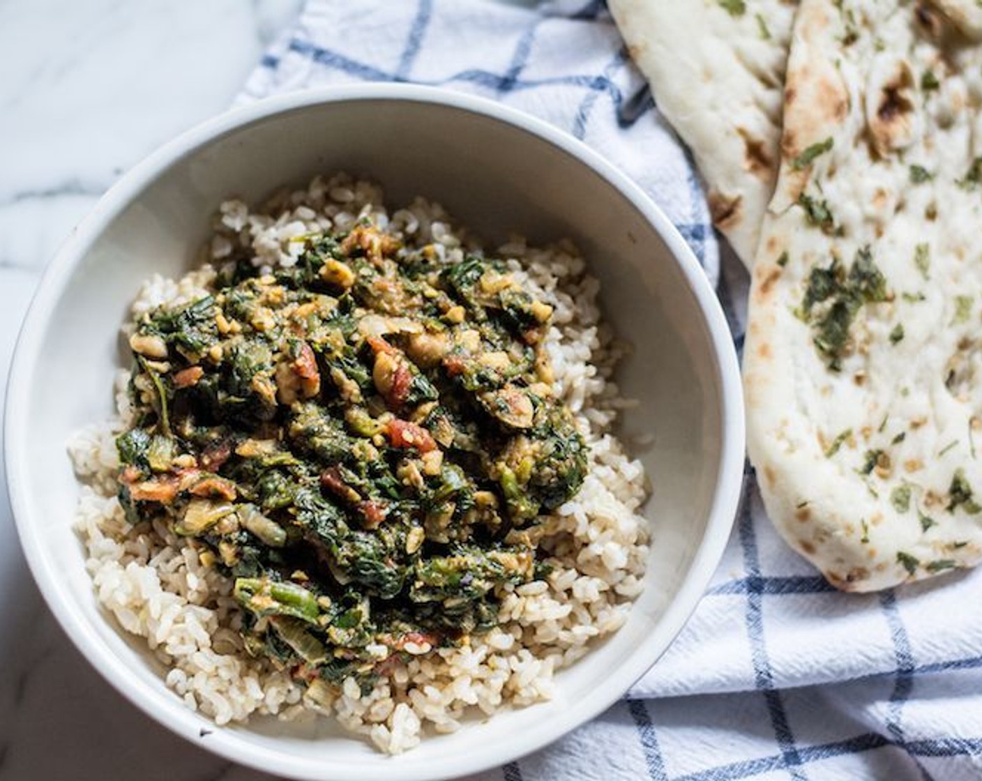 step 11 Serve Spinach Marsala hot over Mahatma® 100% Whole Grain Brown Rice (to taste) with naan bread.