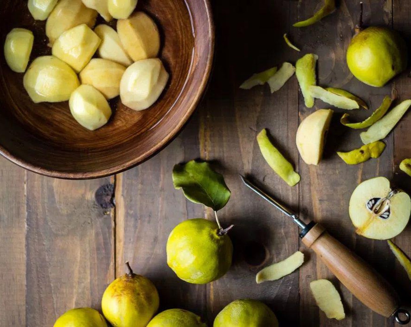 step 1 As you peel, core and quarter your Quince (7 cups) and drop the prepared fruit into a pot of water to keep the quince from browning. Once all of the quince are prepped, make sure they are fully submerged in water and bring pot to a simmer over medium low heat - simmer for approx. two hours until quince are soft and are easily pierced with a knife