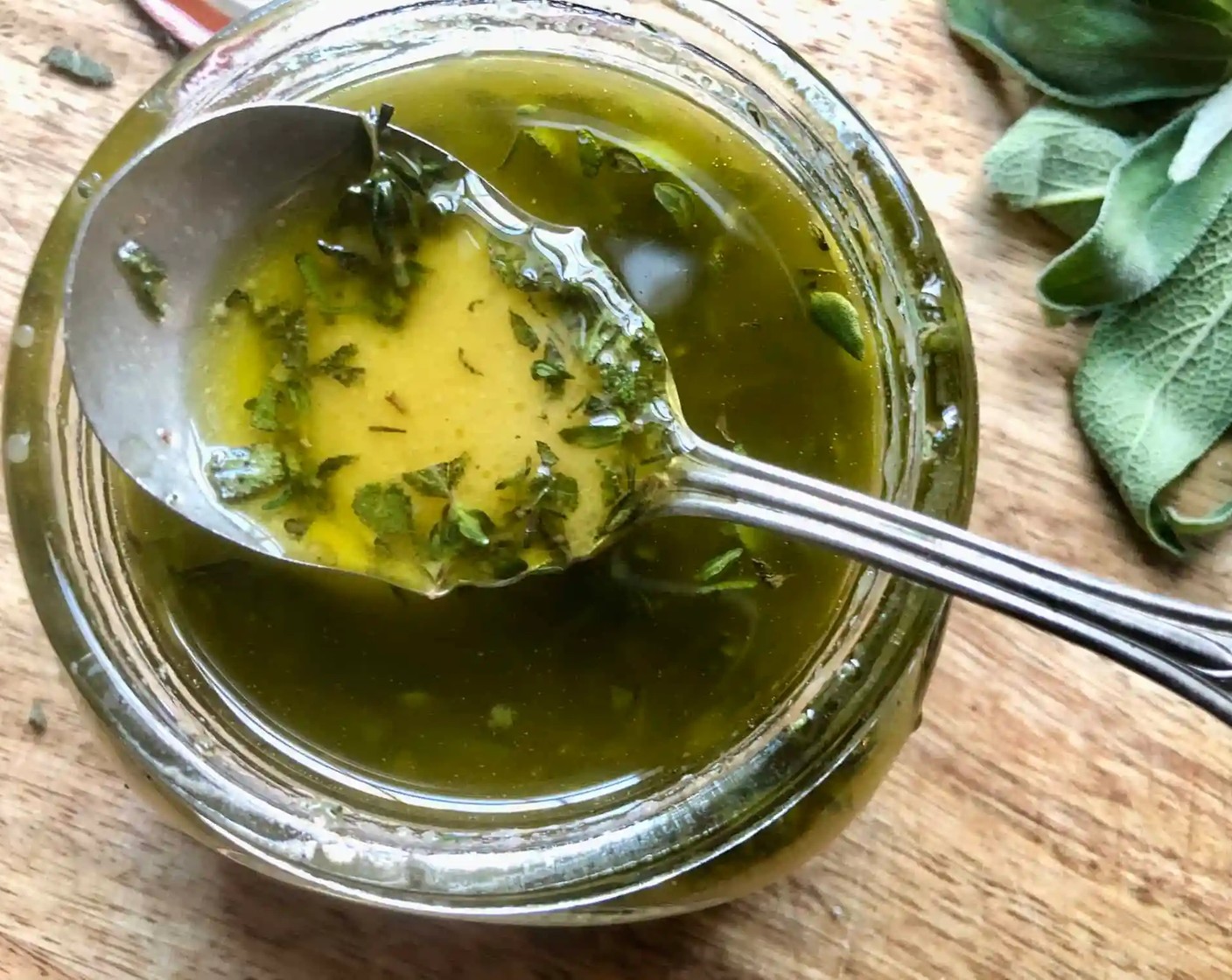 step 1 Combine the Extra-Virgin Olive Oil (1/3 cup), Apple Cider Vinegar (1/4 cup), Dijon Mustard (1 Tbsp), Apple Butter (1 Tbsp), Maple Syrup (1/2 Tbsp), Fresh Thyme Leaves (1 Tbsp), and Sage Leaves (1/2 Tbsp) in a jar with a lid and shake. Taste and season with Kosher Salt (to taste) and Freshly Ground Black Pepper (to taste). Set aside.
