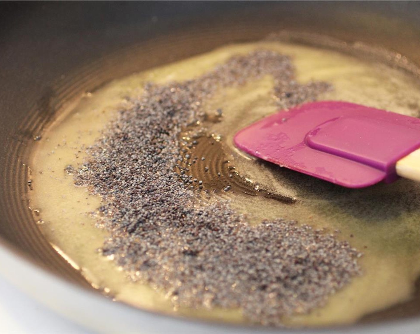 step 9 In a skillet over medium heat, melt the Vegan Margarine (2 1/2 Tbsp) and then add the Poppy Seeds (1 Tbsp).