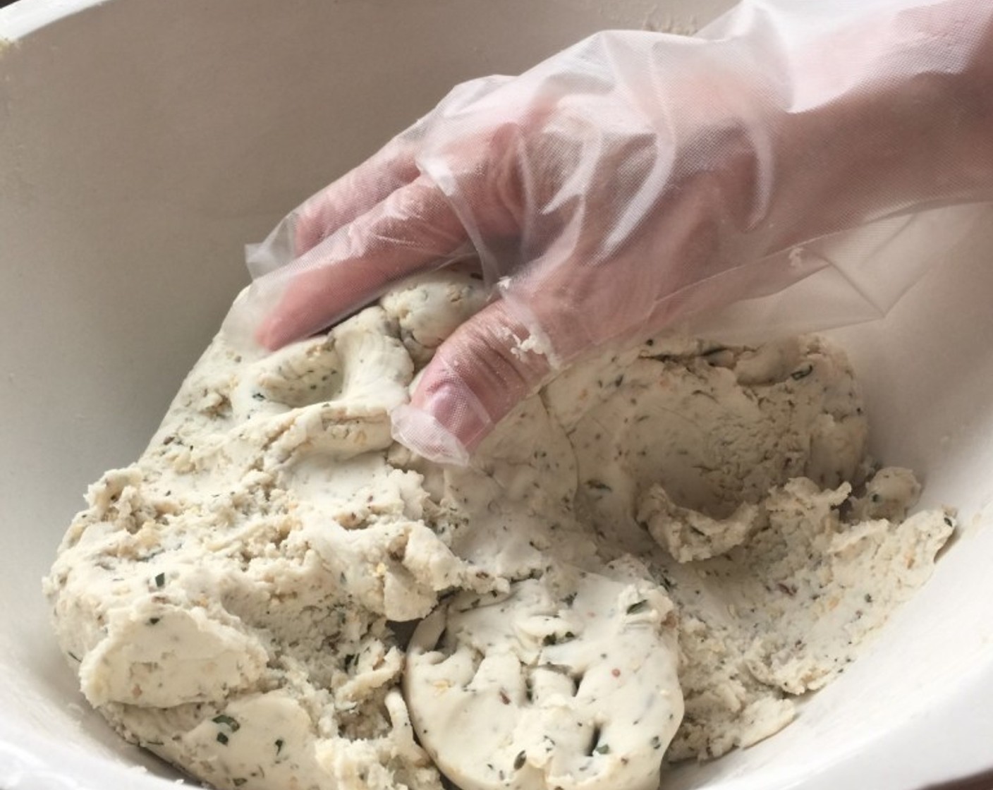 step 8 Once the dough is combined well, use your hands to knead and form into a smooth, non-sticky and soft dough.