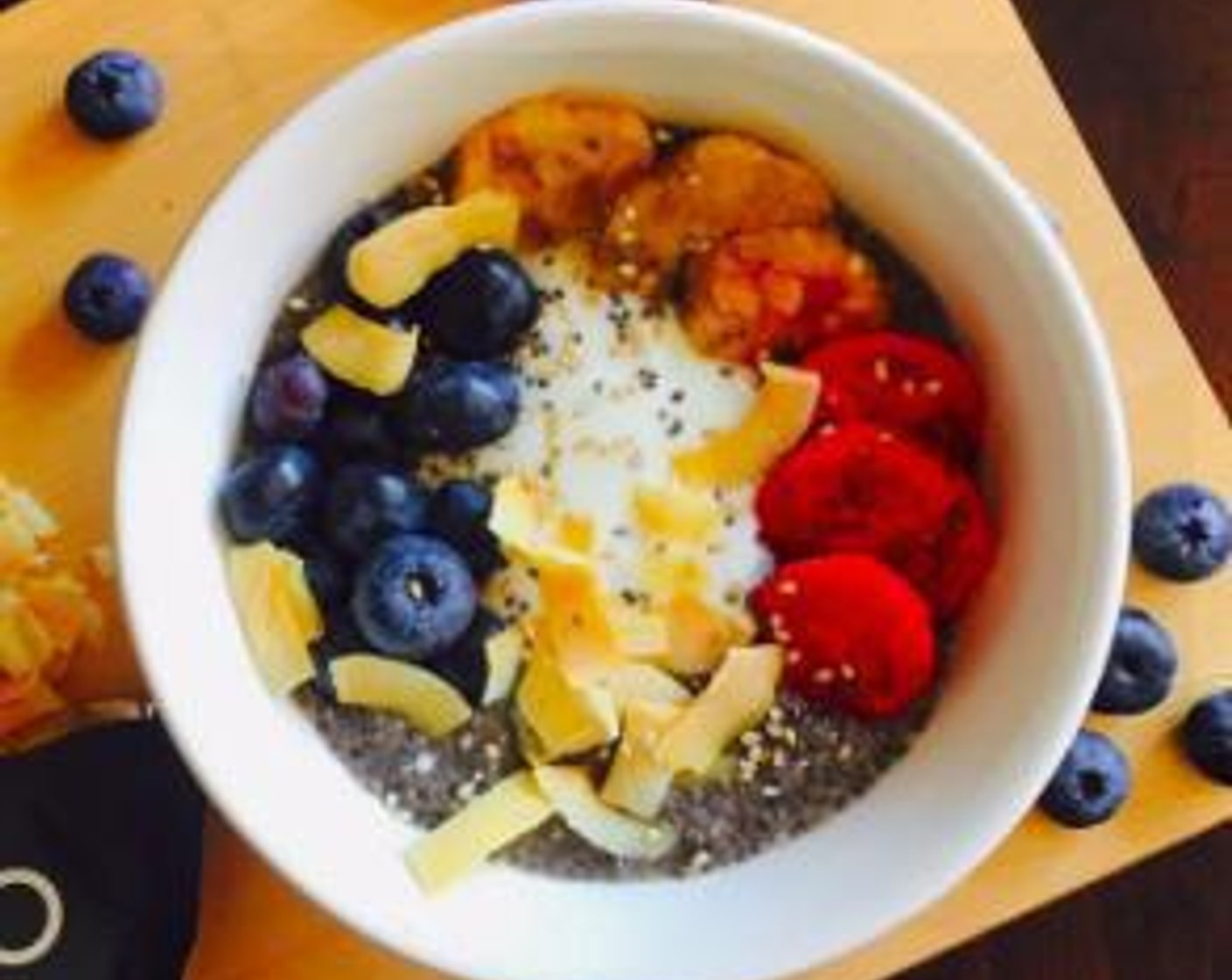 step 3 Top off the pudding with prickly pear slices, Fresh Blueberry (1/2 cup), Greek Yogurt (1/2 cup), a handful of Coconut Chips (4 Tbsp) and Black and White Sesame Seeds (1/2 tsp). Ready to serve!