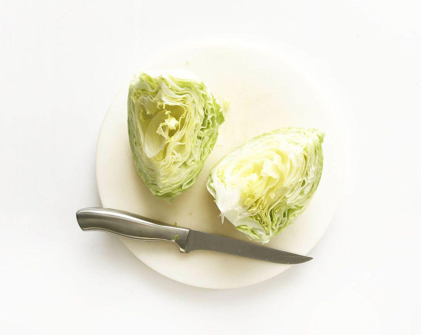 step 4 Rinse and dry the Lettuce (1/2 head), cut it into quarters, and plate each wedge with the middle pointed upward.