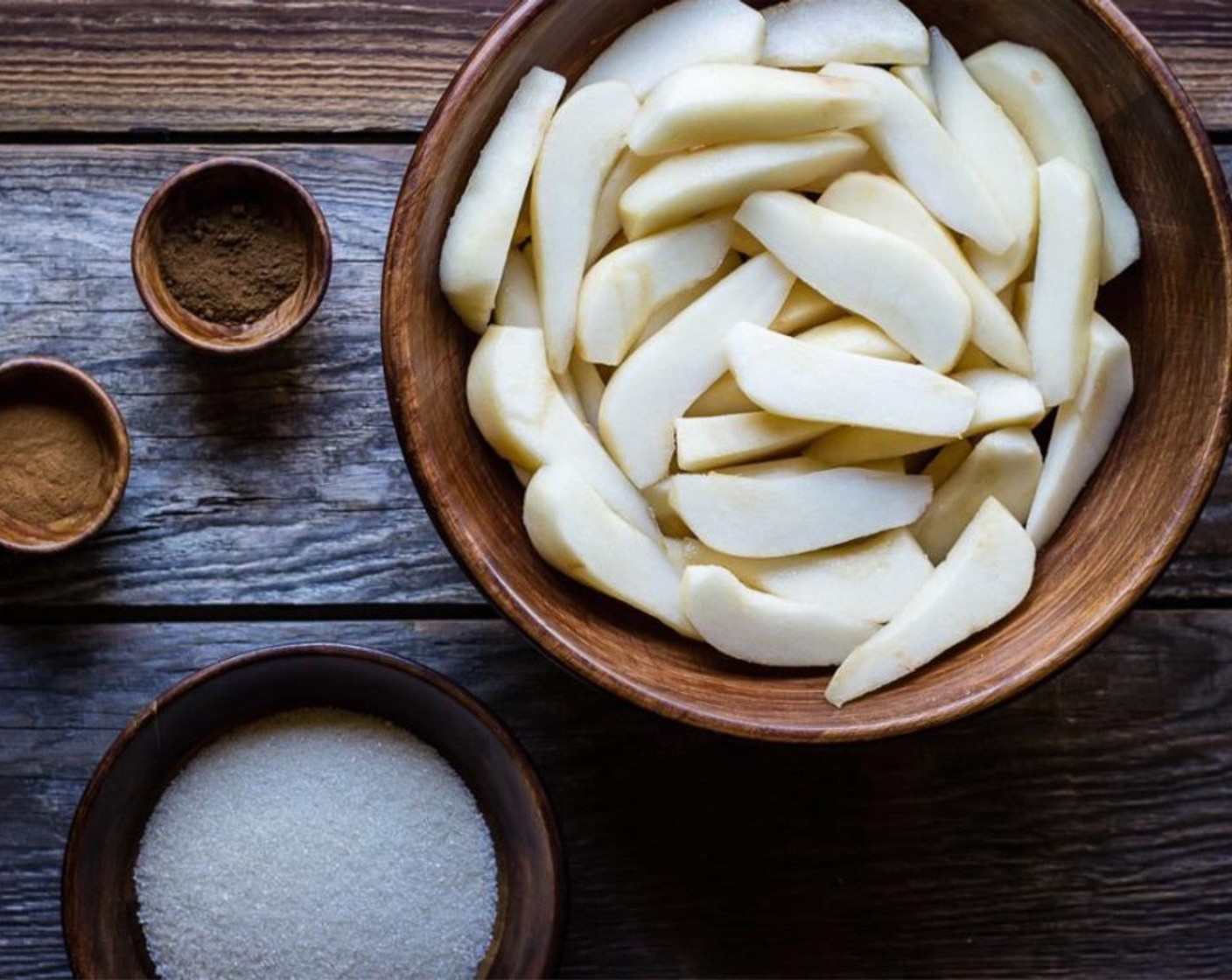 step 5 Sprinkle the prepared Pears (9 cups) with the juice from Lemon (1). In a large bowl mix Gluten-Free All-Purpose Flour (2 Tbsp), Granulated Sugar (1/3 cup), Ground Cinnamon (1/4 tsp), and Ground Cloves (1/8 tsp), together. Add pears and gently toss to coat.