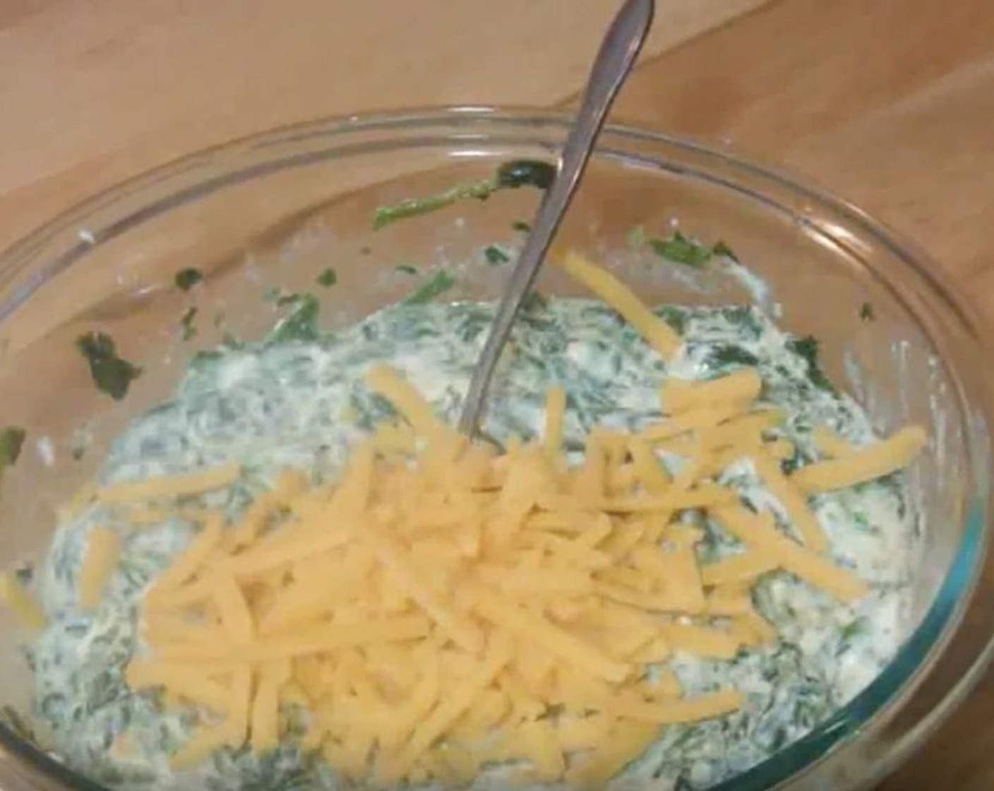 step 7 Add Shredded Cheddar Cheese (4 Tbsp). Mix well.