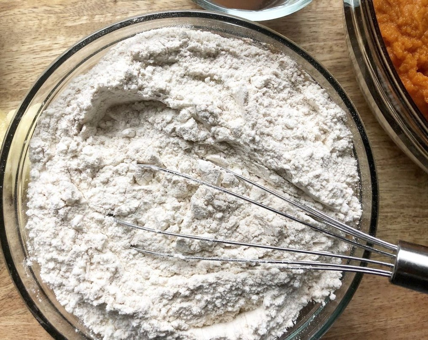 step 3 Whisk the All-Purpose Flour (2 1/2 cups), Ground Cinnamon (1/2 Tbsp), Kosher Salt (1/2 Tbsp), Baking Powder (1 tsp), Baking Soda (1/2 tsp), Whole Nutmeg (1/2 tsp), and Ground Cloves (1/8 tsp) in a medium bowl.