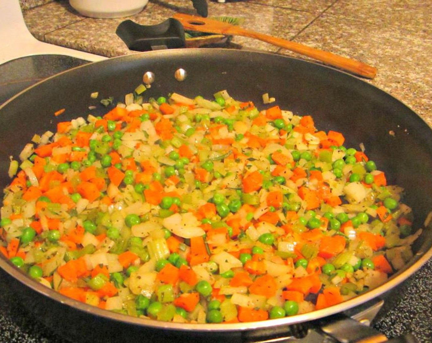 step 2 Saute the Onion (1/2 cup) and Garlic (2 cloves) over medium heat until onions turn translucent then add the Carrot (1/2 cup). Stir mixture and cook for about 8 minutes until carrots are slightly softened.