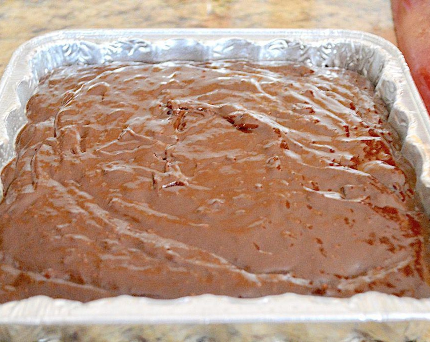 step 6 Then pour in the Red Wine (1 cup). Finally, turn the speed to low and slowly add in the dry ingredients until you have a thick, luscious batter. Pour the batter into the prepared pan.