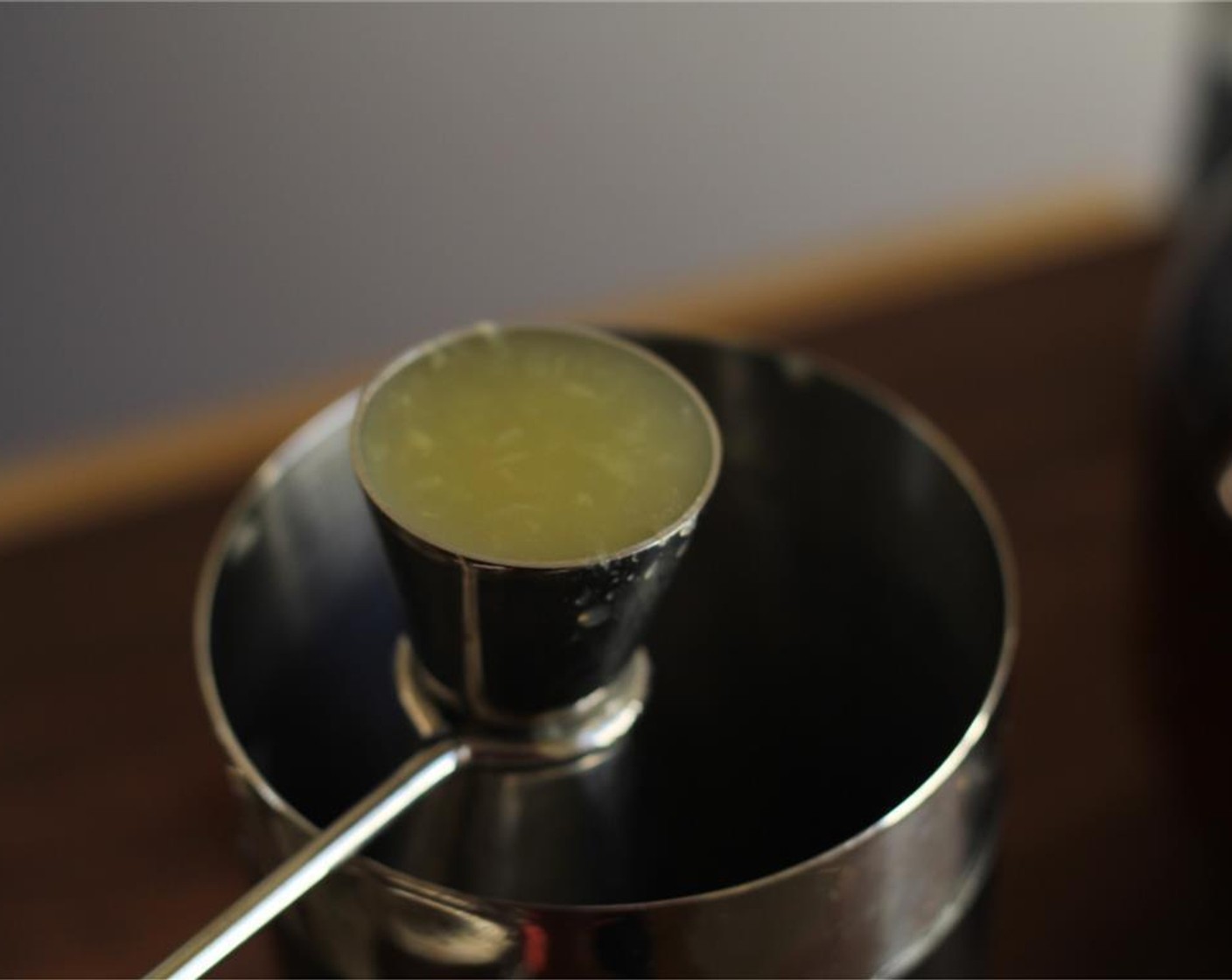 step 2 Add 1 ounce of the Blood Orange Juice and 0.5 ounce of Meyer Lemon Juice to a shaker.