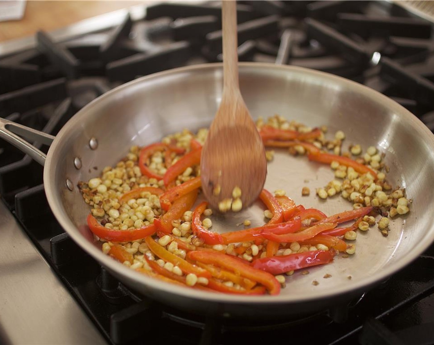 step 14 Add Corn (1 ear) kernels and cook until slightly charred, about one minute.