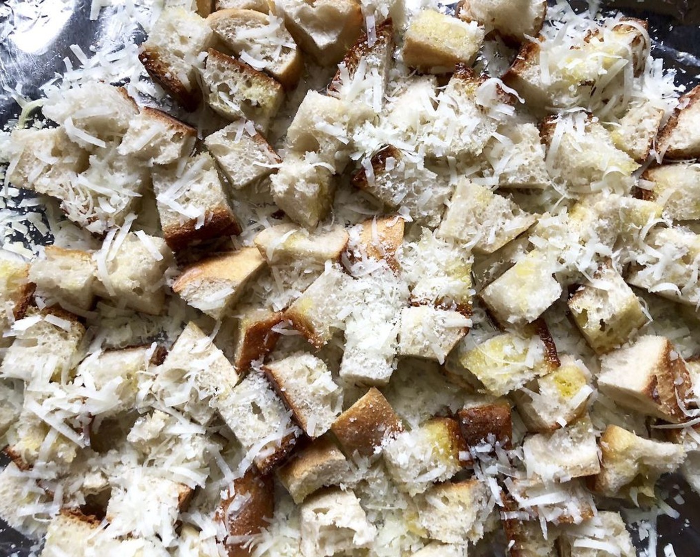 step 10 While the soup is simmering, spread the Rustic Bread (8 oz) in the prepared pan. Toss with the remaining Olive Oil (2 Tbsp) to coat. Sprinkle with the Manchego Cheese (1/4 cup). Bake about 15 minutes or until golden brown, stirring once.