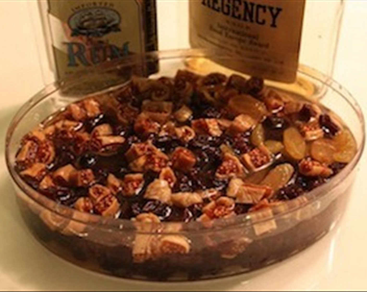 step 1 Chop up the Turkish Fig (2/3 cup), Sun-Maid Raisins (1 cup), and Sultanas (1 cup), and soak them overnight with 1/3 cup water, Brandy (3 Tbsp), and Rum (1 Tbsp).