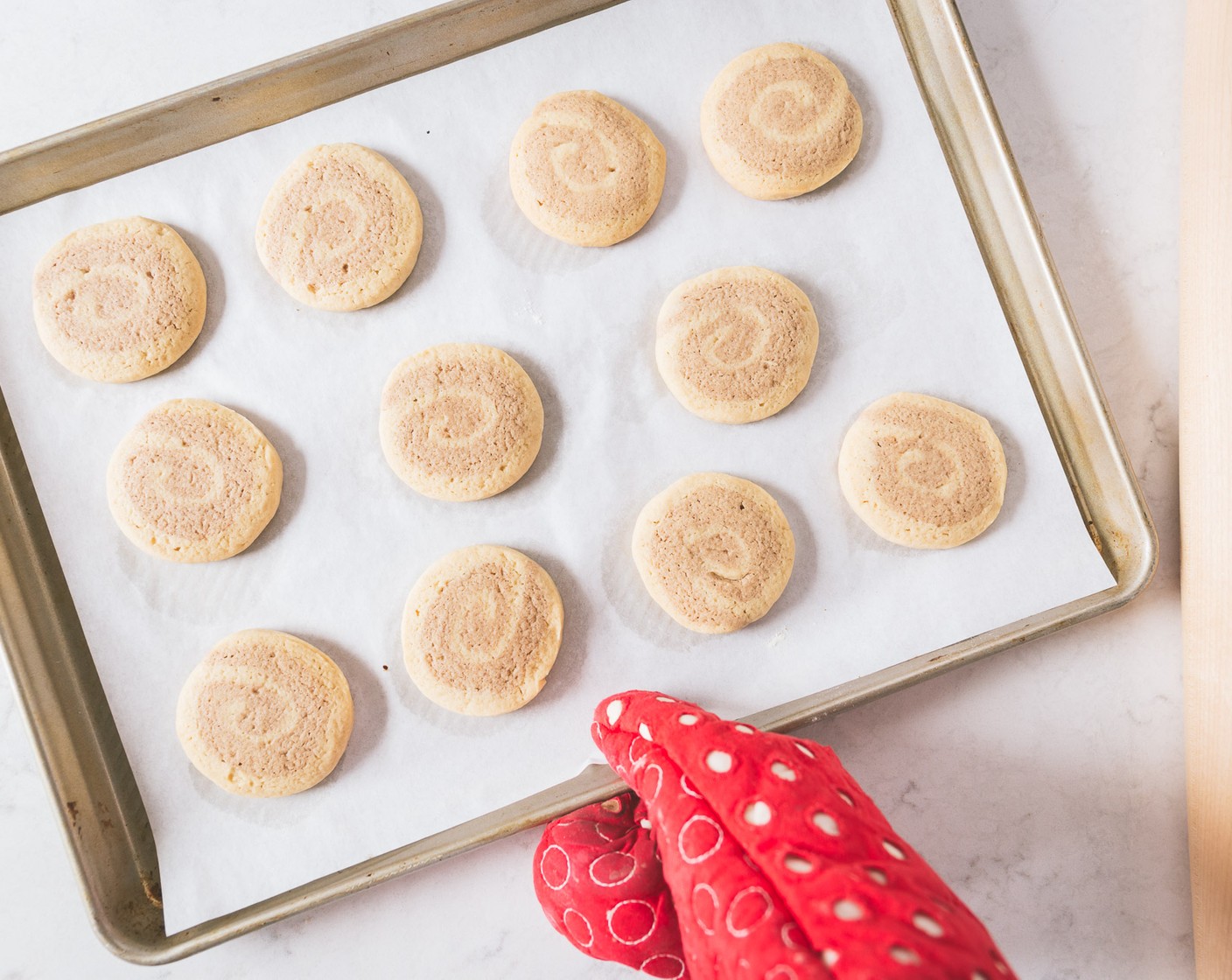 step 12 Set the cookies 2 inches apart on a baking sheet and bake for about 10 minutes, before they turn golden.